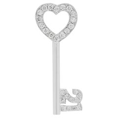 Romantico ciondolo a forma di cuore con chiave, con diamante naturale da 0,68 ct, in oro bianco 18 carati