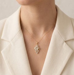 Pendente raffinato con diamante da 0,60 ct in oro giallo 20K