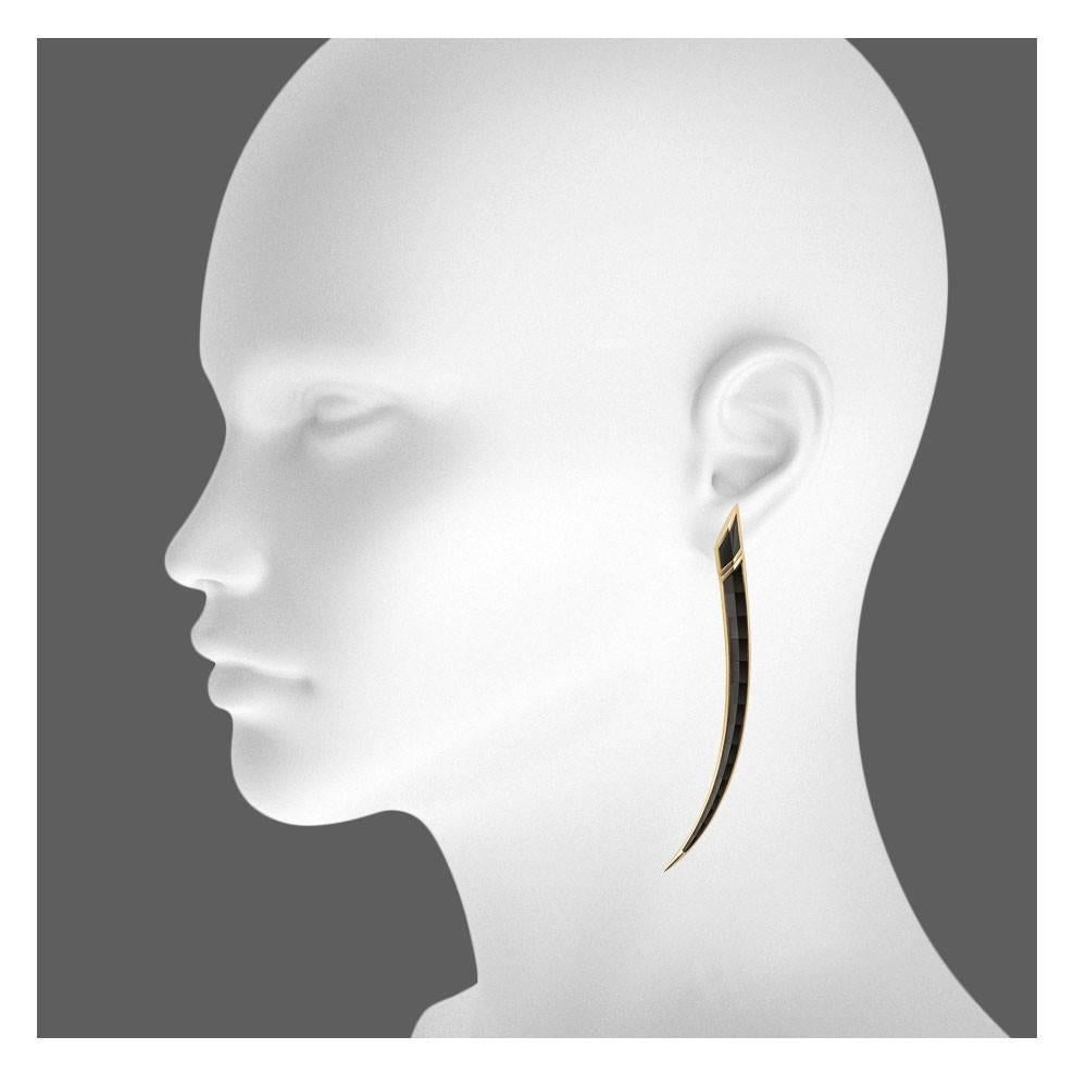 18ct Yellow Gold and Faceted Black Onyx Earrings from the Shaun Leane ‘Sabre’ Fine Jewellery collection.

Length of each earring: 87mm
Width of earring at widest point: 7mm

Each piece of Shaun Leane jewellery is accompanied by a signed
