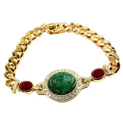 Van Cleef & Arpels Carved Emerald Diamond Ruby Gold Bracelet