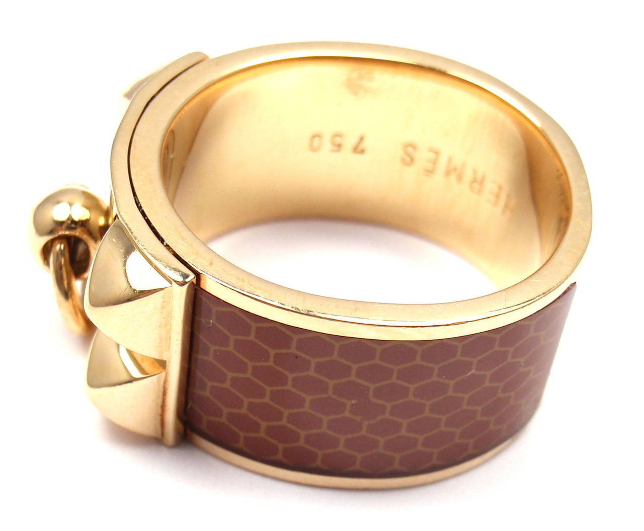 18k Yellow Gold Collier De Chien Enamel Ring by Hermes. 

Details: 
Ring Size: 53 US 6.25
Weight: 14.4 grams
Width: 11mm
Stamped Hallmarks: Hermes 750 53 19801
*Free Shipping within the United States* 

YOUR PRICE: $3,000

0490mtdd