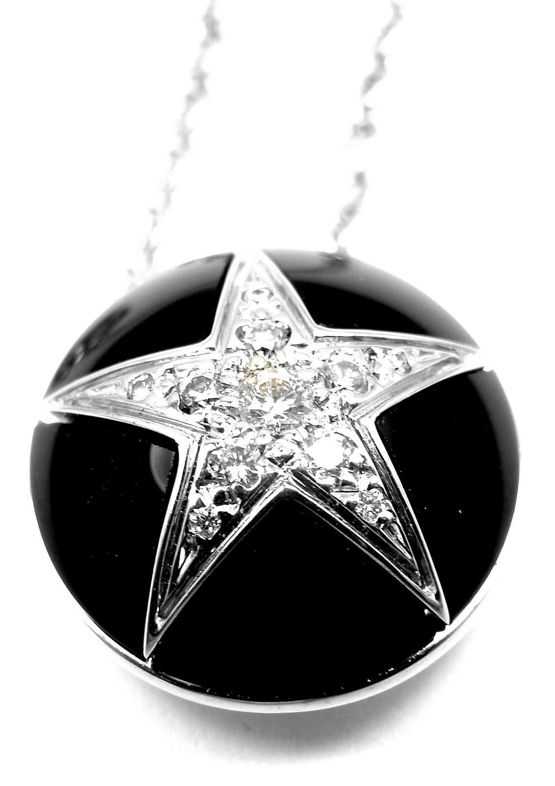 18k White Gold Diamond & Black Agate Comete Star Pendant Necklace by Chanel.
With 11 x Diamond, Totaling Approx. .10ct
VVS1 Clarity F color

Details:
Length: Length: 16