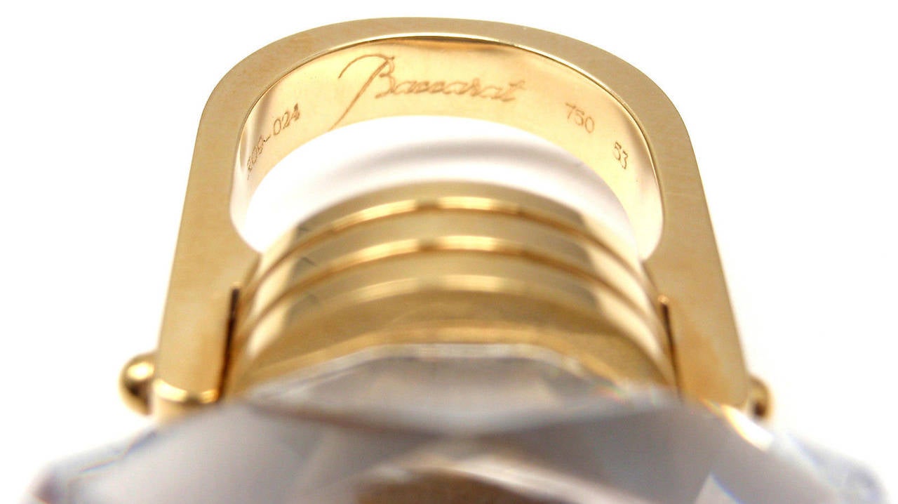 18k Yellow Gold The Bouchons de Carafe Ring by Baccarat. 
With 1 Crystal 31mm x 10mm

Details: 
Ring Size: 53 US 6 1/4
Weight: 34 grams
Width:  10mm
Stamped Hallmarks: Baccarat R09-024 750 53 French Hallmarks
*Free Shipping within the United