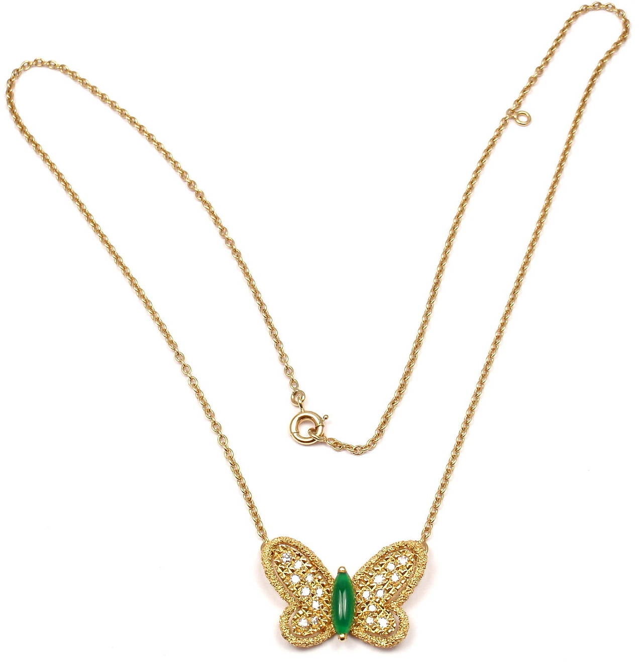 18k Yellow Gold Diamond Chalcedony Butterfly Necklace by Van Cleef & Arpels. This necklace is from Van Cleef & Arpels' 1976 bufferfly collection. 
With 1 marquise shaped chalcedony stone. And 18 diamonds, VS1 clarity, G color. Total Diamond Weight: