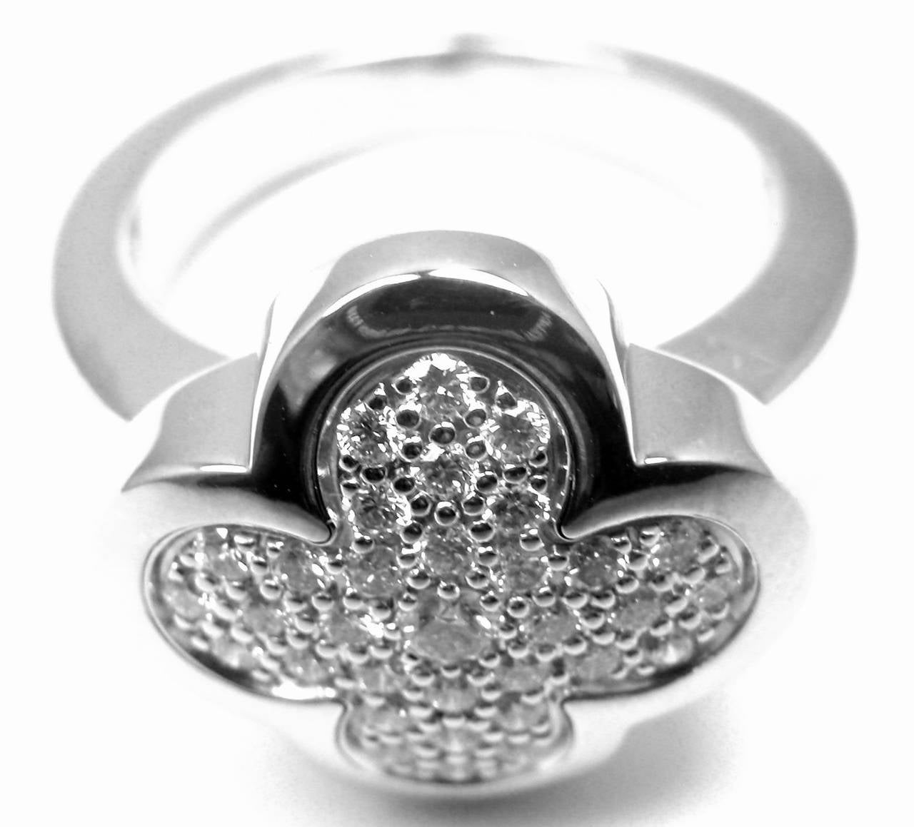 18k White Gold Diamond Pure Alhambra Ring by Van Cleef & Arpels. 
With 33 round brilliant cut diamond VVS1 clarity, F color total weight .70ct

Details:
Size: European 50 US 5.25
Width: 16mm
Weight: 12.6 grams
Stamped Hallmarks: VCA 750 50 B(*serial