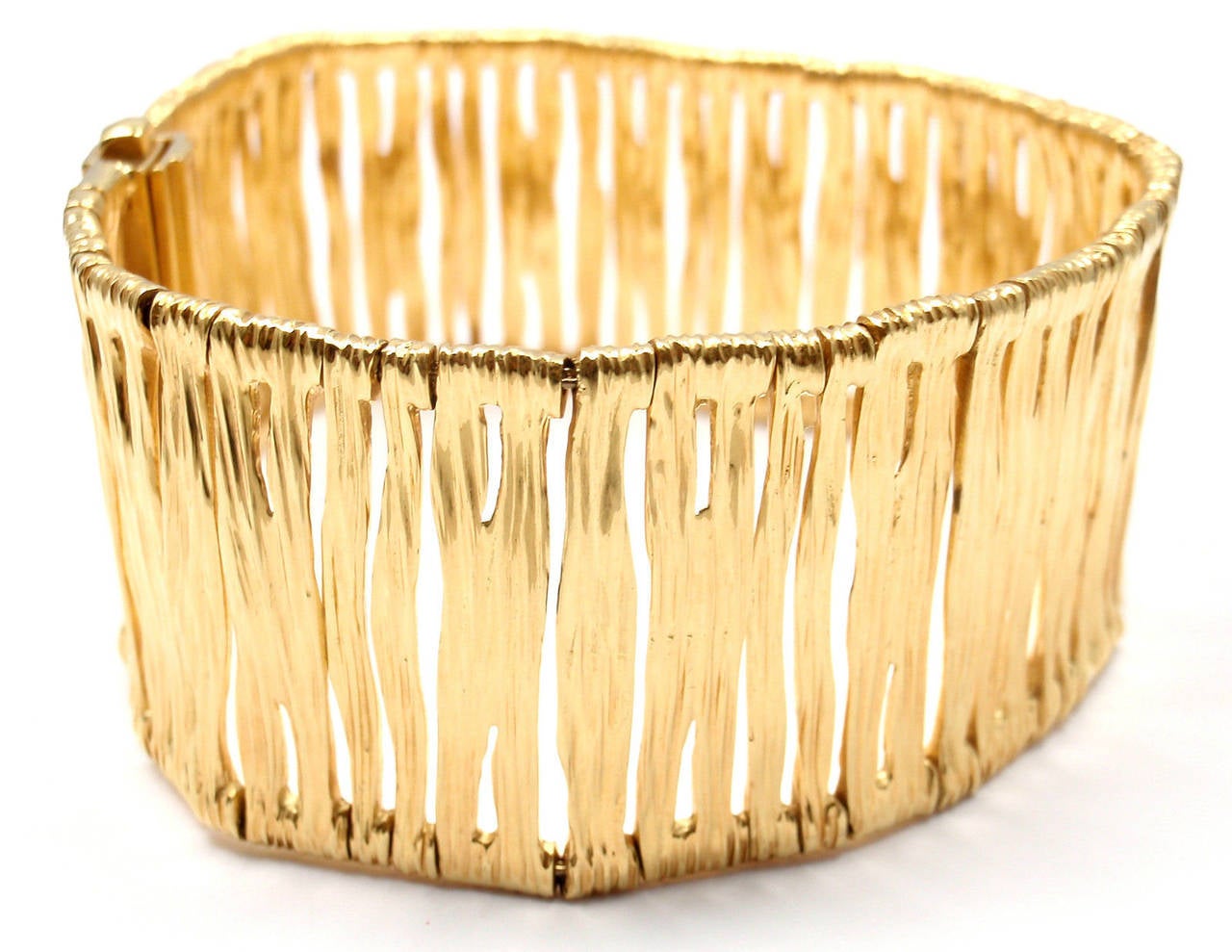 18k Yellow Gold Elephant Skin Wide Bracelet by Roberto Coin. 

Details: 
Weight: 66.3 grams
Length: 7 3/4