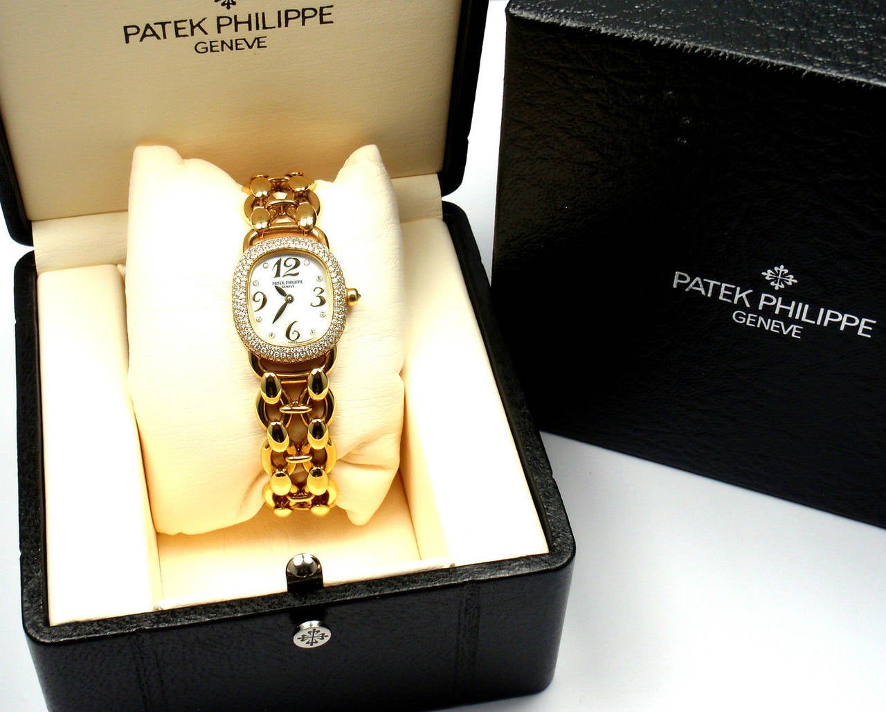 Patek Philippe Lady's Yellow Gold and Diamond Golden Ellipse Wristwatch Ref 4831 4