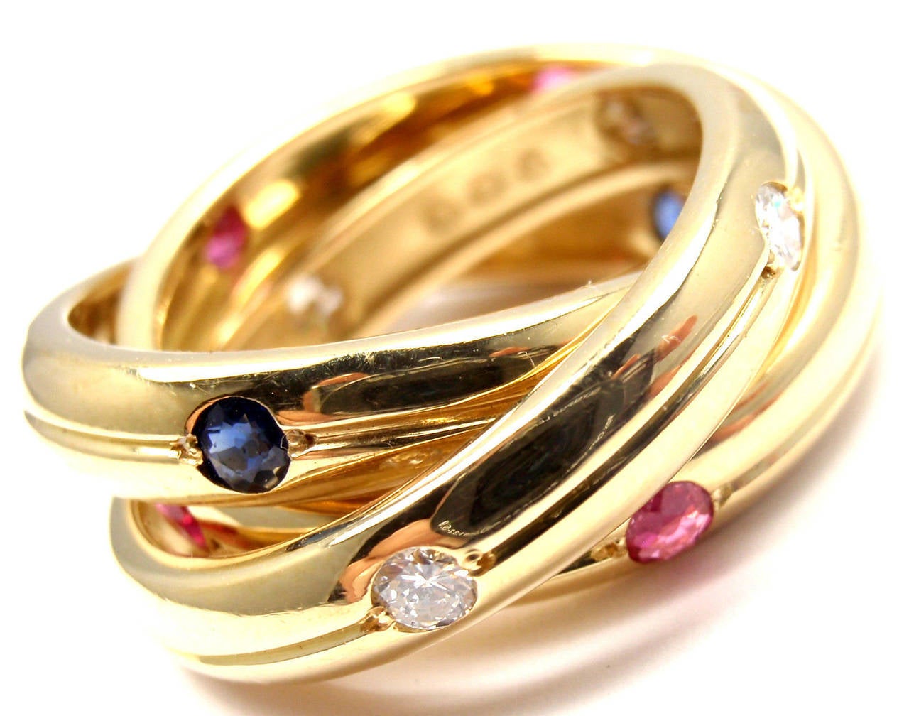 18k Yellow Gold Diamond Ruby Sapphire Trinity Band Ring by Cartier. 
With 5 round brilliant cut diamonds VS1 clarity, G color total weight approximately .18ct and 5 rubies & 5 sapphires

Details: 
Size: European 50, US 5 1/4
Weight: 13