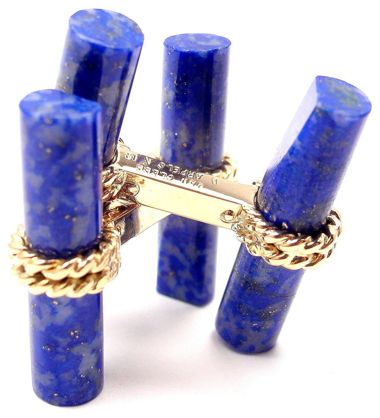 18k Yellow Gold Lapis Lazuli Cufflinks by Van Cleef & Arpels Paris.

Details:
Measurements: 22mm x 8mm
Weight: 9.6 grams
Stamped Hallmarks: Van Cleef & Arpels 18k C9037 L8
*Free Shipping within the United States*

YOUR PRICE: