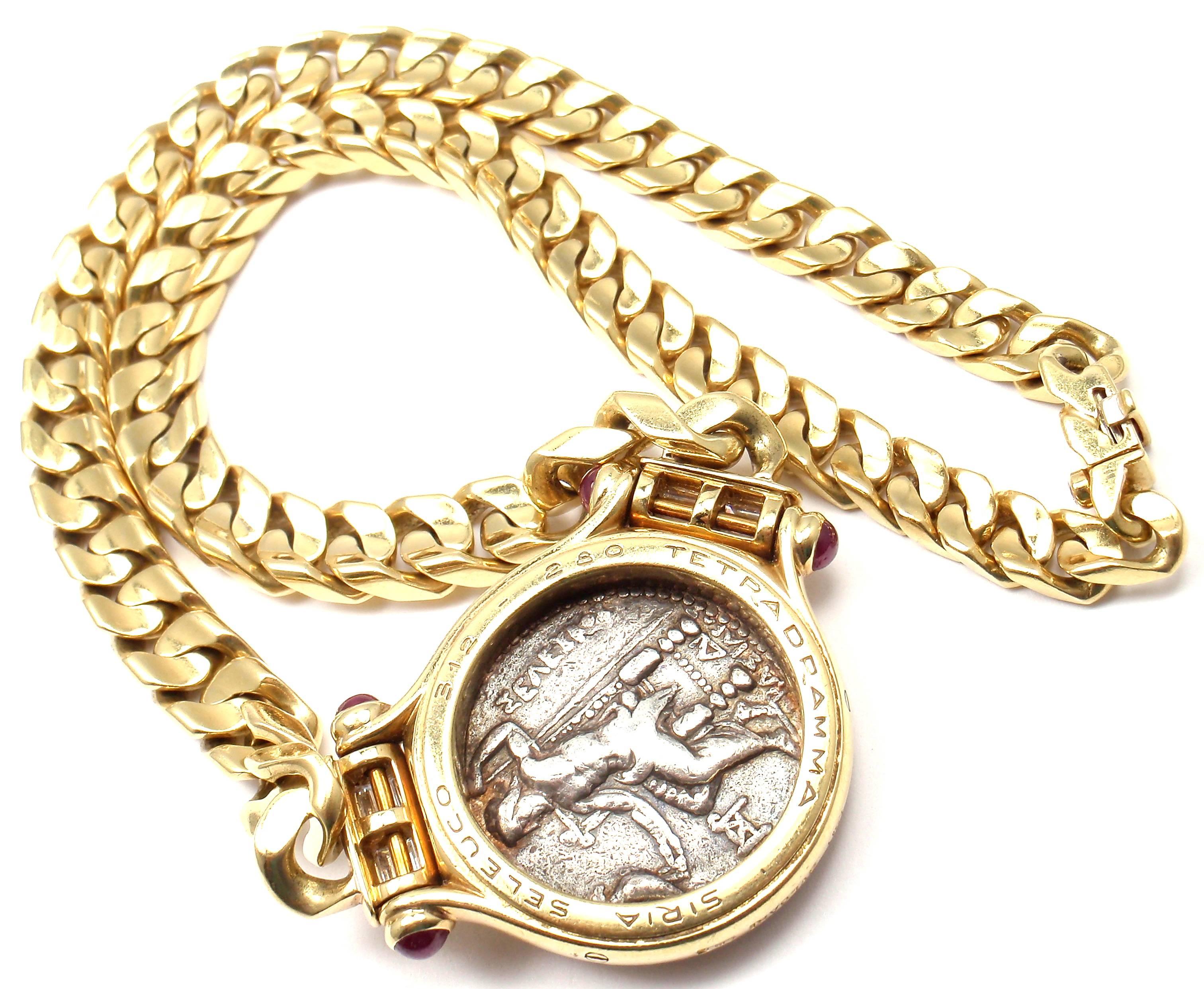 Bulgari yellow gold diamond and ruby ancient coin, link chain necklace.
With 1 Large Ancient Coin Siria Seleuco Tetradramma 312-280
8 VS1 clarity, G color diamonds 
4 cabochon rubies

This necklace comes with the original Bulgari