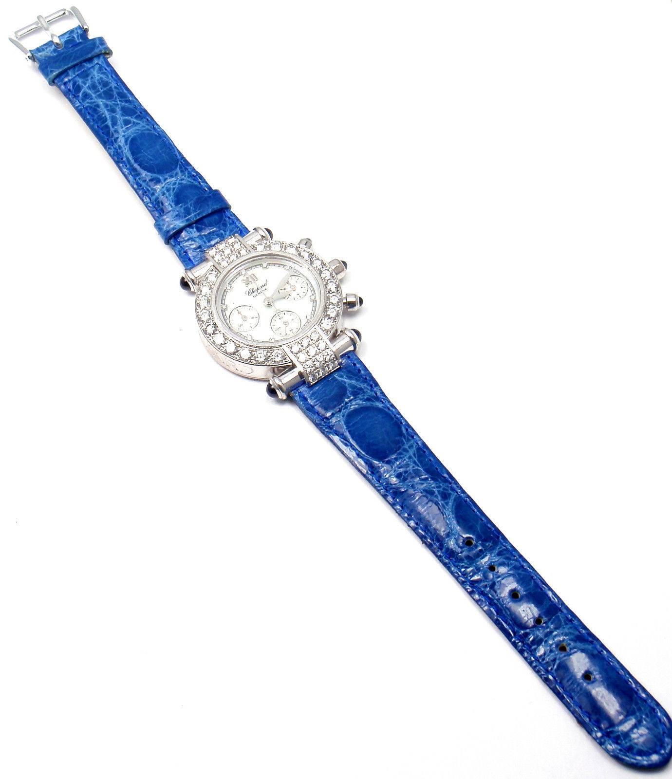 18k white gold diamond and sapphire Imperiale Chronograph wristwatch by Chopard.
Chopard Imperiale Chronograph Watch, round 18K white gold case (32mm diameter), bezel and lugs set with 44 diamonds, blue Debeers crocodile leather strap with 18K