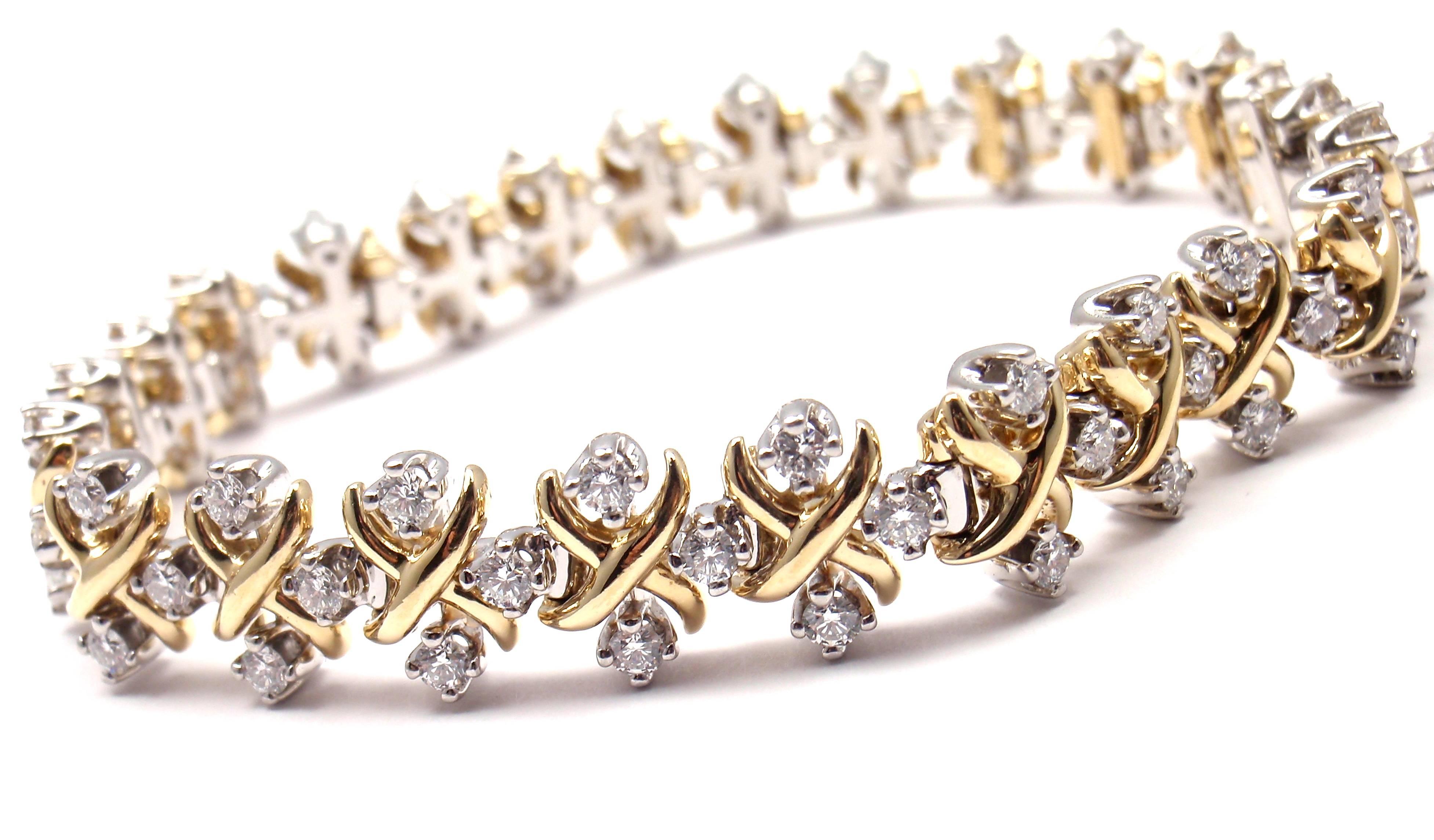 18k Yellow Gold & Platinum Diamond Lynn Bracelet by Jean Schlumberger for Tiffany & Co. 
With 75 round brilliant cut diamonds VS1 clarity,
E color 
Total weight approximately 2.68ct
This bracelet comes with Tiffany & Co box.

Details: