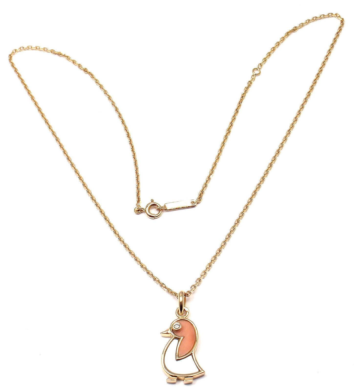 18k Yellow Gold Coral Mother Of Pearl And Diamond Pendant Necklace 
by Van Cleef & Arpels. 
With 1 round brilliant cut diamond
Coral & Mother of pearl  

Details: 
Length: 18