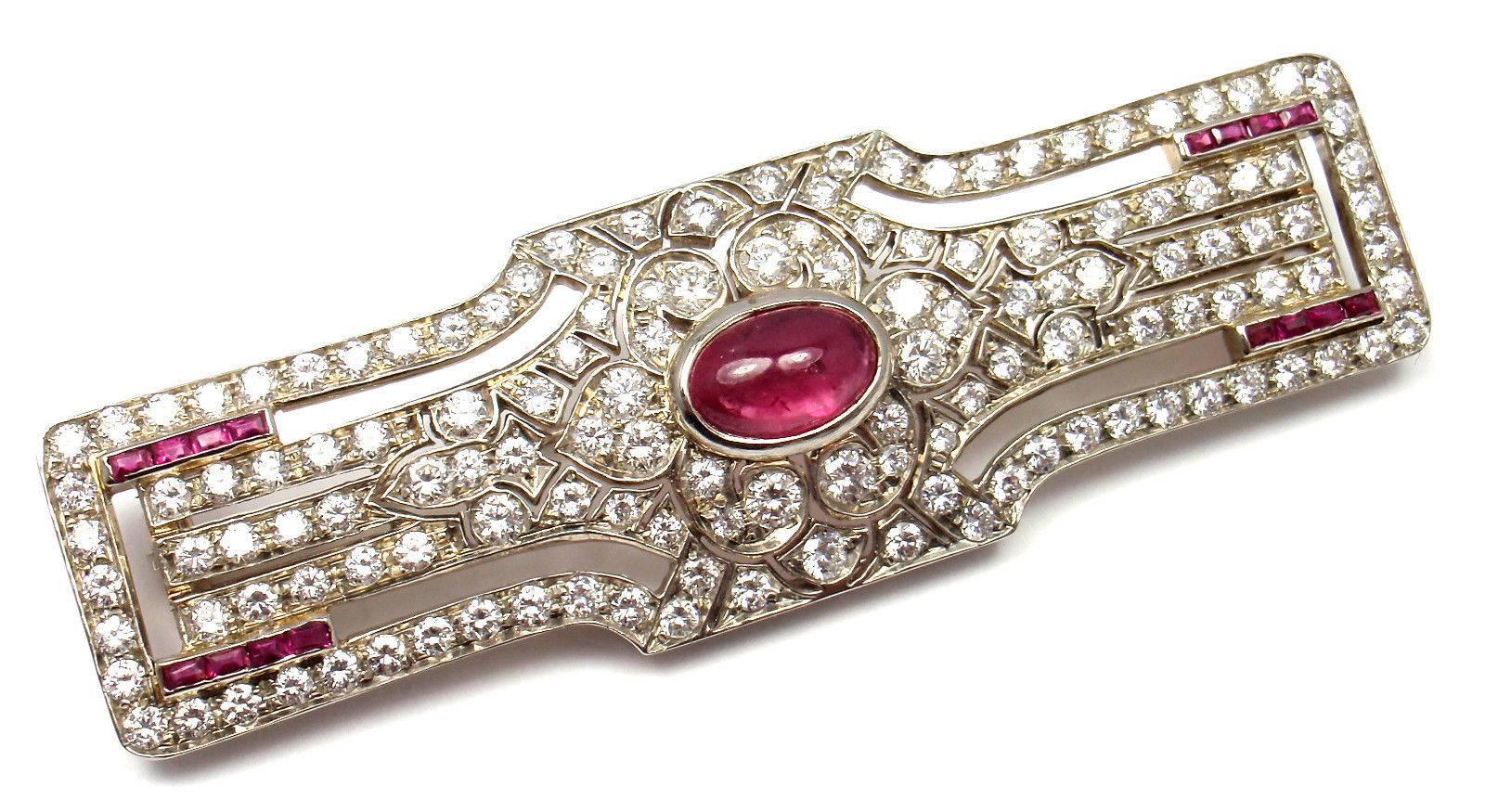 Platinum Vintage 3.50ct Diamond And Oval Cabochon Ruby Pin Brooch by Garrard London.
With 3.5ctw in old miner diamonds VS1 clarity, G color
Oval Cabochon Ruby.

Details: 
Weight: 13.2 grams 
Measurements: 63mm x 19.5mm x 8.5mm

*Free