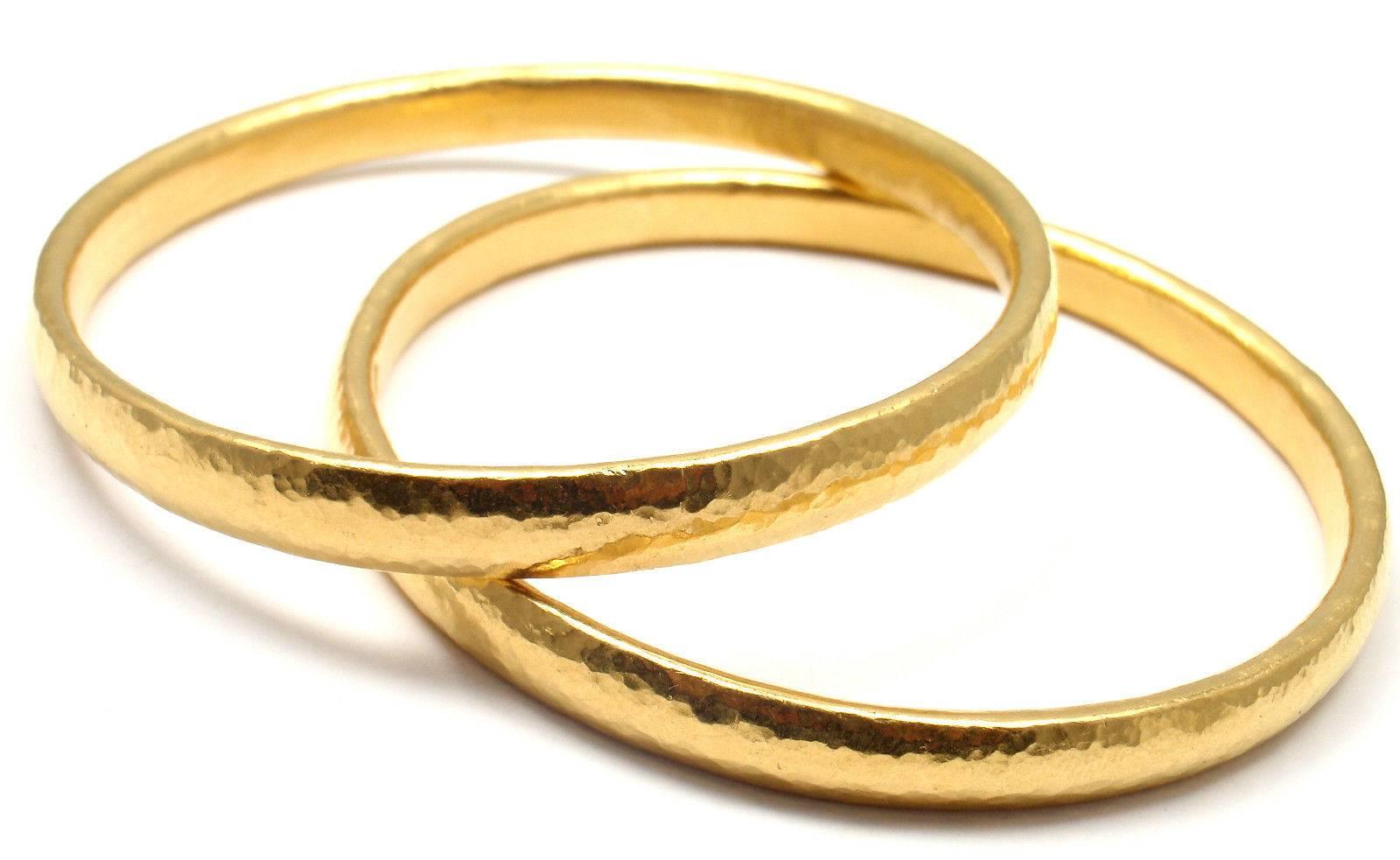 This is a set of two striking 24k Yellow Gold slip on bangle bracelets from the legendary GURHAN. 
These bracelets are SOLD OUT, when they were available the
Retail Price was $7,550 each x 2 $15,100 plus tax.

Measurements: 
Length: 8