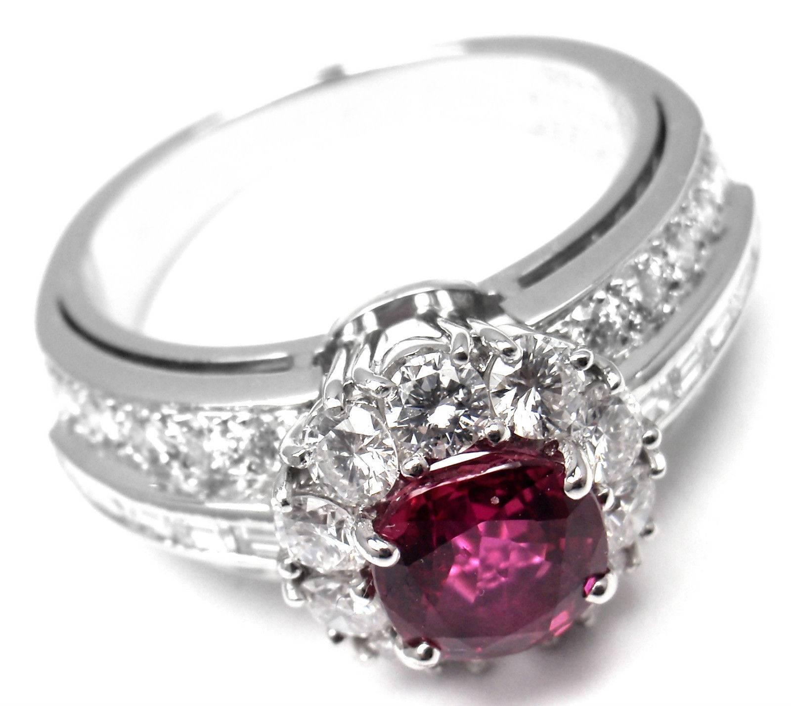 Platinum Diamond Ruby Ring by Van Cleef & Arpels.  
With 30 round brilliant cut diamonds VVS1 clarity, E color and 10 emerald cut diamonds VVS1 clarity, E color total weight approx. 1.50ct
no heat round ruby total weight approx. 1.20ct
 