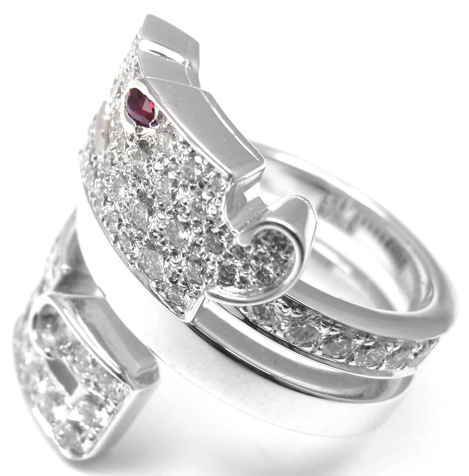 18k White Gold Le Baiser Du Dragon Diamond Ruby Ring by Cartier. 

With 56 round brilliant cut diamonds VVS1 clarity, E color total weight 
approx. 1.68ct
This ring comes with its original Cartier box. 

Details: 
Ring Size: European 53 US 6