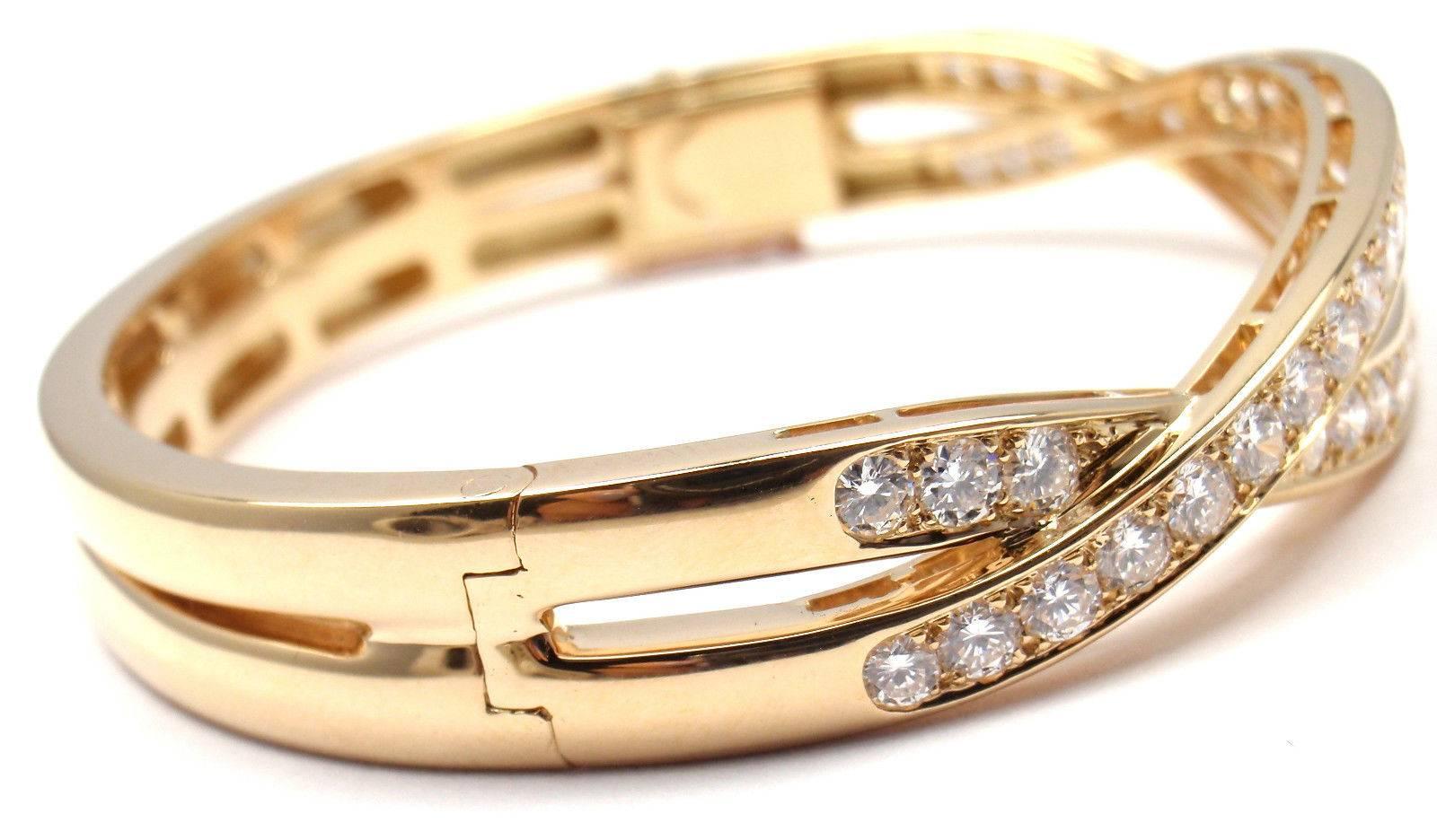 18k Yellow Gold Diamond Bangle Bracelet by Van Cleef & Arpels. 
With 50 brilliant round cut diamond VVS1 clarity, E color
Total weight approx. 5ct

Details:
Length: 7
