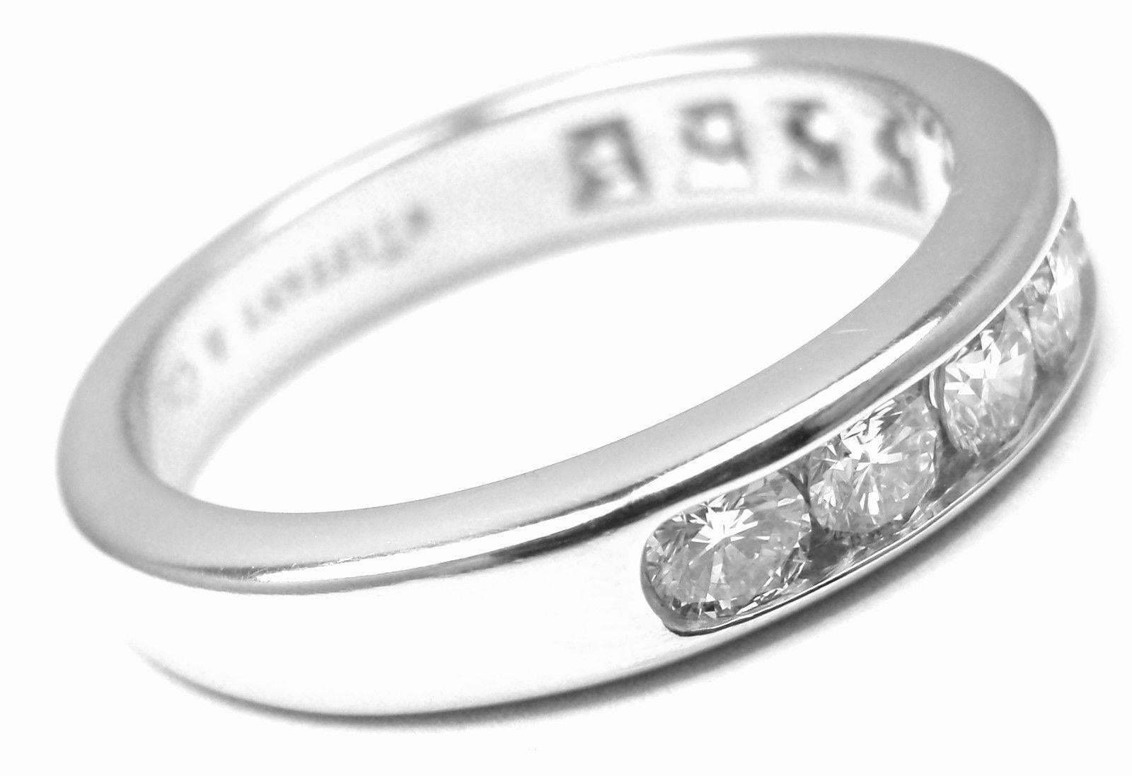 Tiffany & Co. Platinum Diamond Half Circle 4mm Band Ring.  
With 10 Round brilliant cut diamonds VS1 clarity, E color total weight approx. .90ct

Measurements:  
Ring Size: 7
Weight: 7.6 grams 
Width: 4mm
Stamped Hallmarks: Tiffany&Co