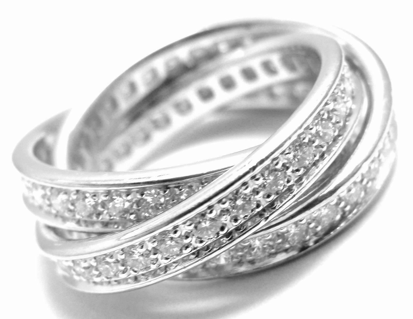 18k White Gold Diamond Trinity Band Ring by Cartier.  
With 96 Round Brilliant cut diamonds VVS1 clarity, F-H color total weight approx. 1.55ct  
This ring comes with Cartier box.  
Details:  
Size: European 52 US 6 
Weight: 9.5 grams  
Width:
