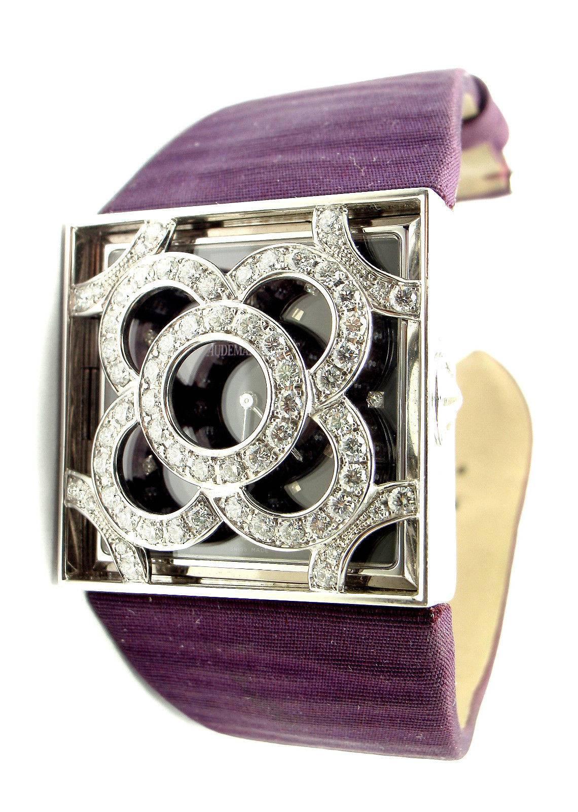 Audemars Piguet, montre-bracelet pour femme en or blanc, diamants et satin avec quartz