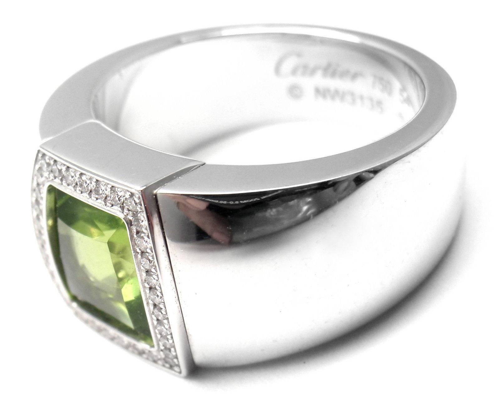 18k White Gold Peridot Diamond La Dona Ring by Cartier.  
With 33 round brilliant cut diamonds VS1 clarity, G color total weight approximately .15ct
1 Peridot 9mm x 8mm 2ct

This ring comes with an original Cartier box.  
Details:  
Ring Size: