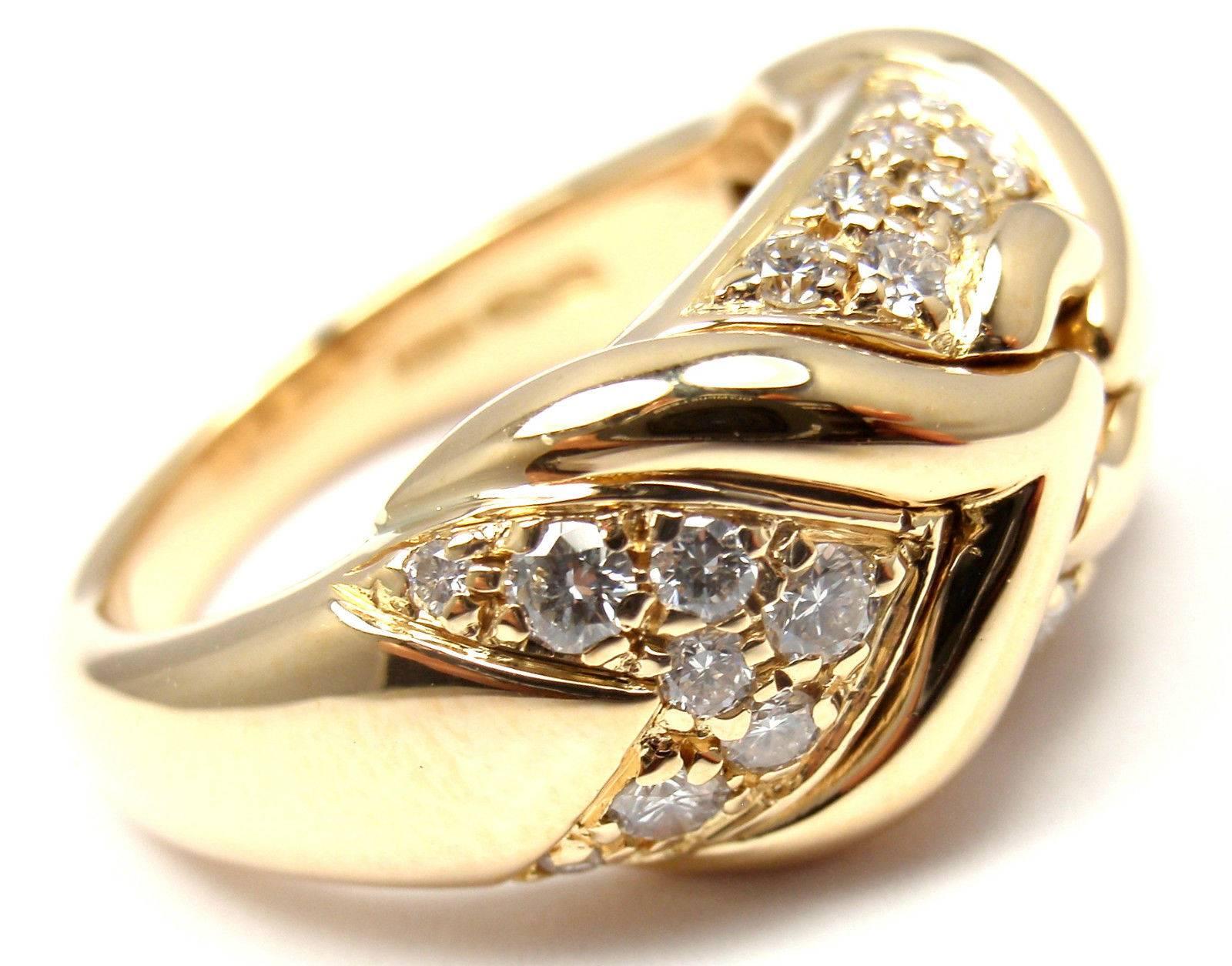 bague à anneau en or jaune 18 carats et diamant de Bulgari. 
Avec 30 diamants ronds d'un poids total d'environ 0,75 ct, pureté VS1, couleur E

Détails : 
Taille de l'anneau : 5.5
Poids : 10,6 grammes 
Largeur : 10mm 
Poinçons estampillés :