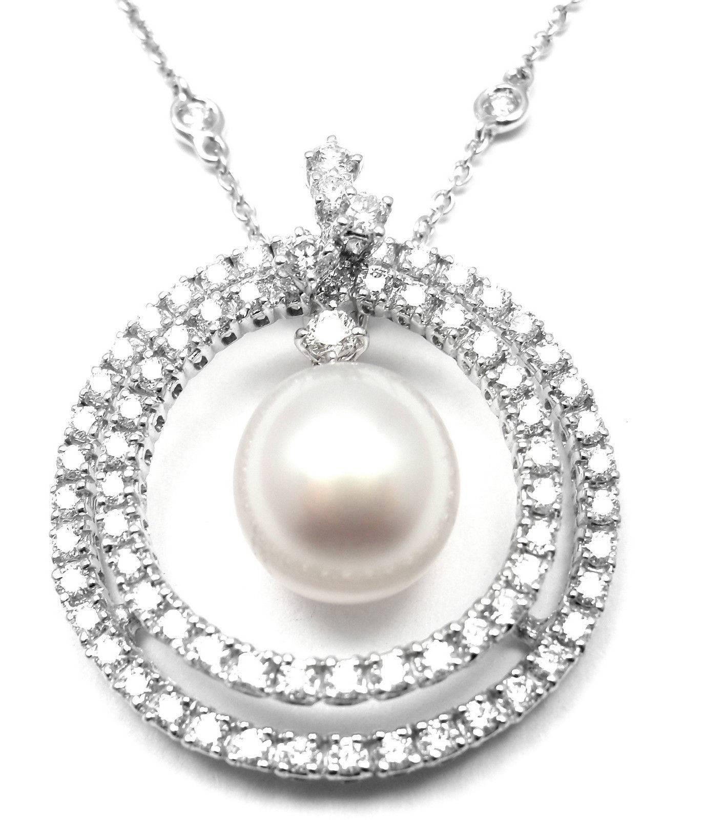 18k White Gold Diamond And Pearl Pendant Necklace by Damiani. 
With round brilliant cut diamonds total weight approximately 1.70ct VS1 clarity, G color
1 cultured pearl 10mm
This necklace comes with Box, Certificate.  

Details: 
Measurements: