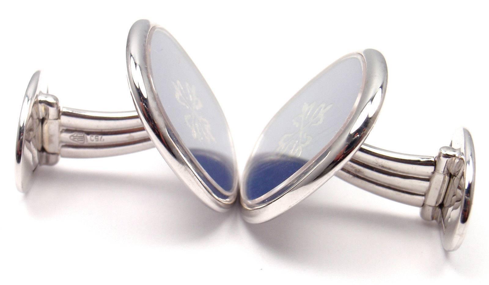 18k White Gold Ellipse Calatrava Blue Enamel Large Cufflinks by Patek Philippe. 

Details: 
Measurements: 22mm x 20mm x 21mm
Weight: 28.8 grams 
Stamped Hallmarks: Patek Philippe 750 Geneve 90033135 

*Free Shipping within the United States* 
