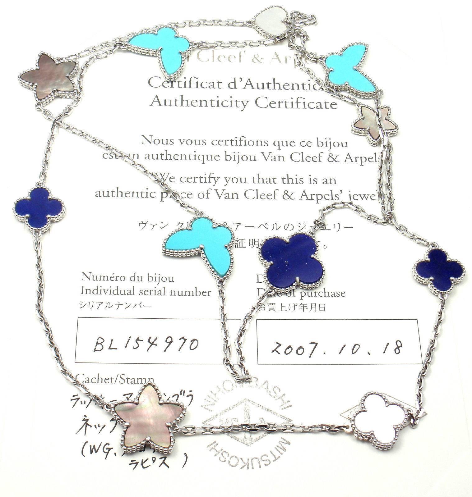 18k White Gold Lucky Alhambra Turquoise Lapis Mother of Pearl Necklace by  Van Cleef & Arpels.
With3 butterfly turquoise stones
3 lapis stones
3 grey mother of pearl stones
2 white mother of pearl stones 
Details:  
Length: 32