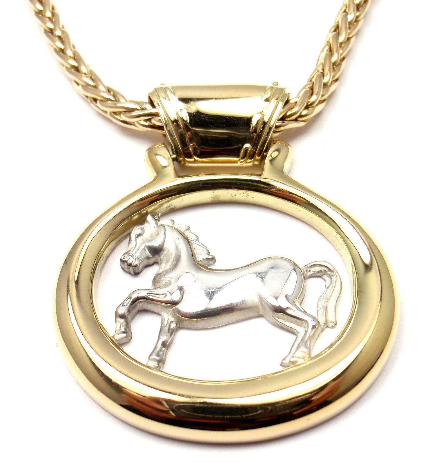 18k Yellow And White Gold Horse Pendant Necklace by Hermes. 

Details: 
Chain Length: 18