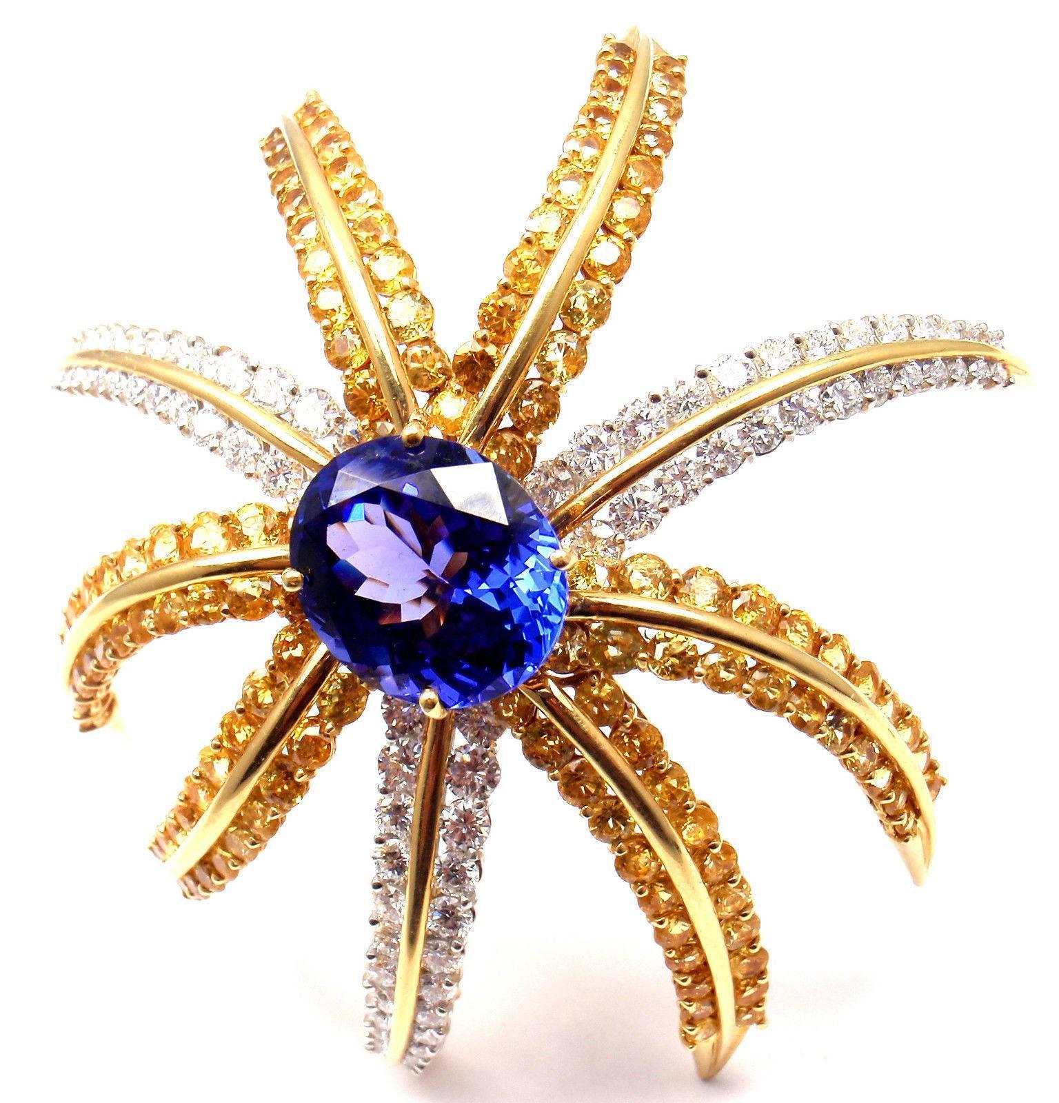 Platinum And 18k Yellow Gold Diamond Yellow Sapphire Tanzanite Fireworks Pin Brooch by Tiffany & Co.  
This brooch comes with original Tiffany & Co box and a Replacement Valuation from 2008 for $26,0000.
With 78 round brilliant cut diamonds VVS1