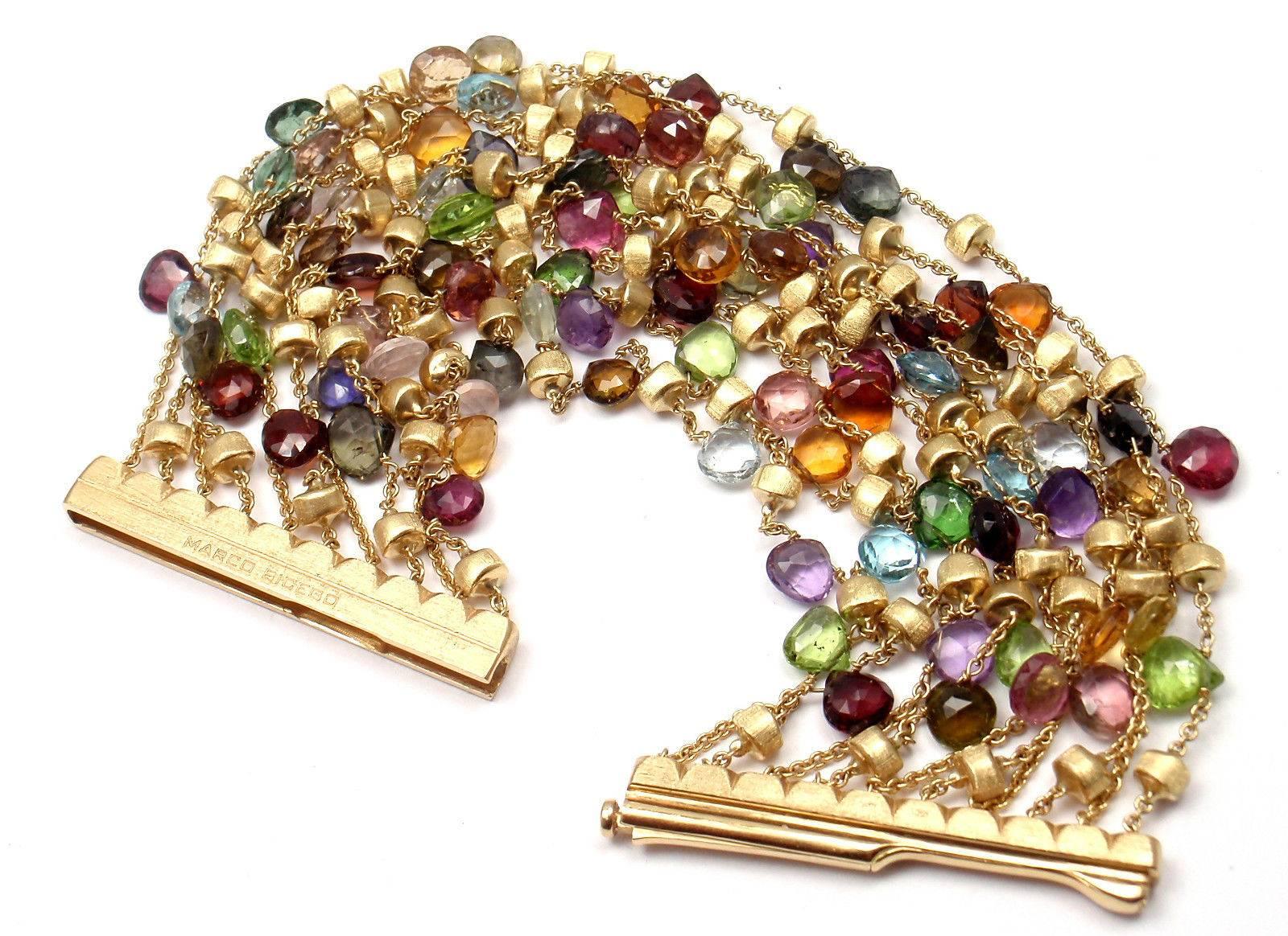 18k Yellow Gold Paradise Multicolor Gemstone 10 Strand Bracelet by Marco Bicego.  
With Mixed semi-precious colored stones
 
Details: 
Length: 7