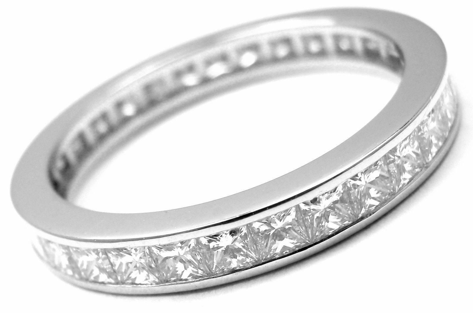Platinum Princess Cut Diamond Eternity Band Ring by Cartier.
With Round brilliant cut diamonds VVS1 clarity, F color 
total weight approx. 1.72ct
This ring comes with original Cartier box.

Details:
Ring Size: European 53 US 6 1/4
Weight: 3.8