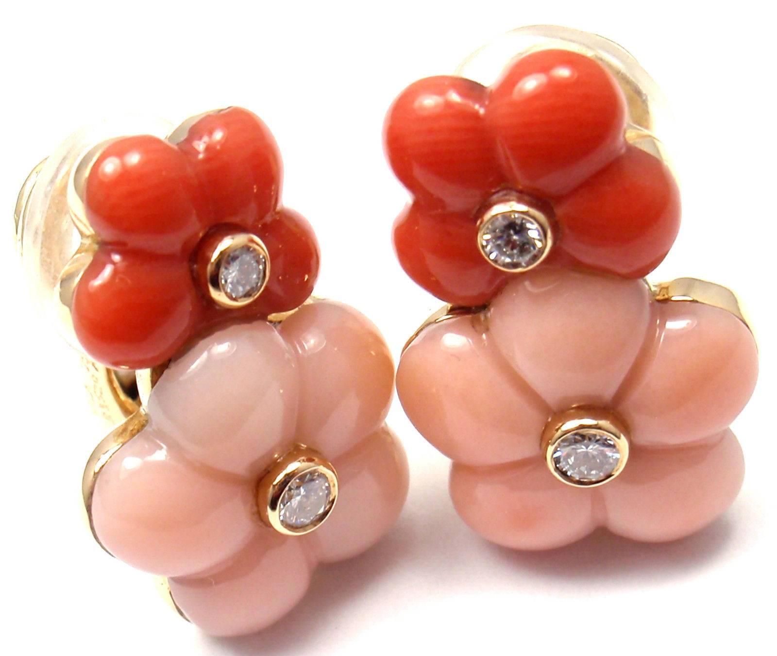 18k Yellow Gold Diamond Red And Pink Coral Flower Earrings by 
Van Cleef & Arpels.

These earrings are clips made for non pierced ears, but they can be converted for pierced ears.

With 4 round brilliant cut diamonds VVS1 clarity, E color total