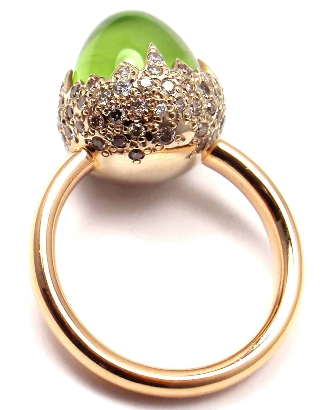 18k Rose & White Gold Peridot Diamond Chimera Ring by Pomellato.
With 1 Peridot 11mm x 13mm
Round Brilliant Cut Diamonds total weight approx. .25ct

This ring comes with original Pomellato box and a certificate.

Details:
Ring Size: