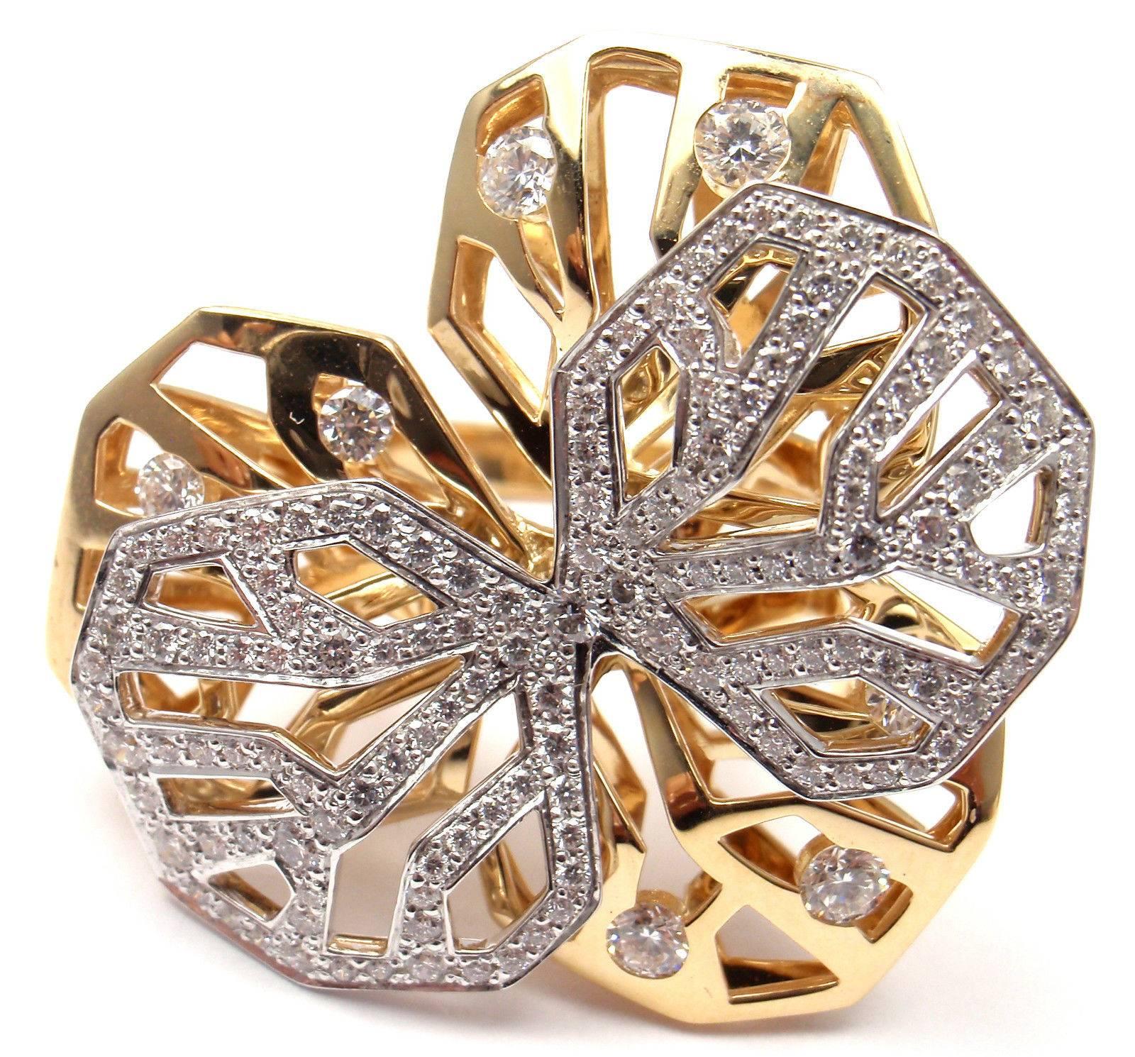 18k White And Yellow Gold Diamond Caresse D'orchidées Orchid Flower Ring by Cartier.
With Round Brilliant Cut Diamonds VVS1 clarity, E color total weight approx. 1.50ct
This ring is in mint condition and it comes with original Cartier paper and