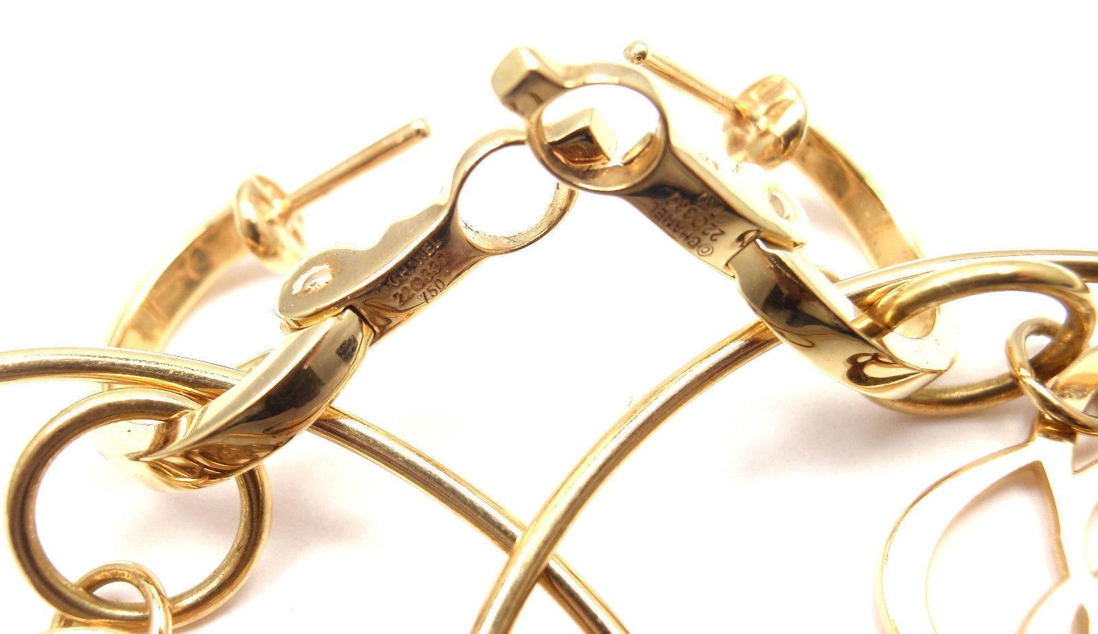 Chanel Camelia Large Gold Flower Hoop Earrings In New Condition In Southampton, PA