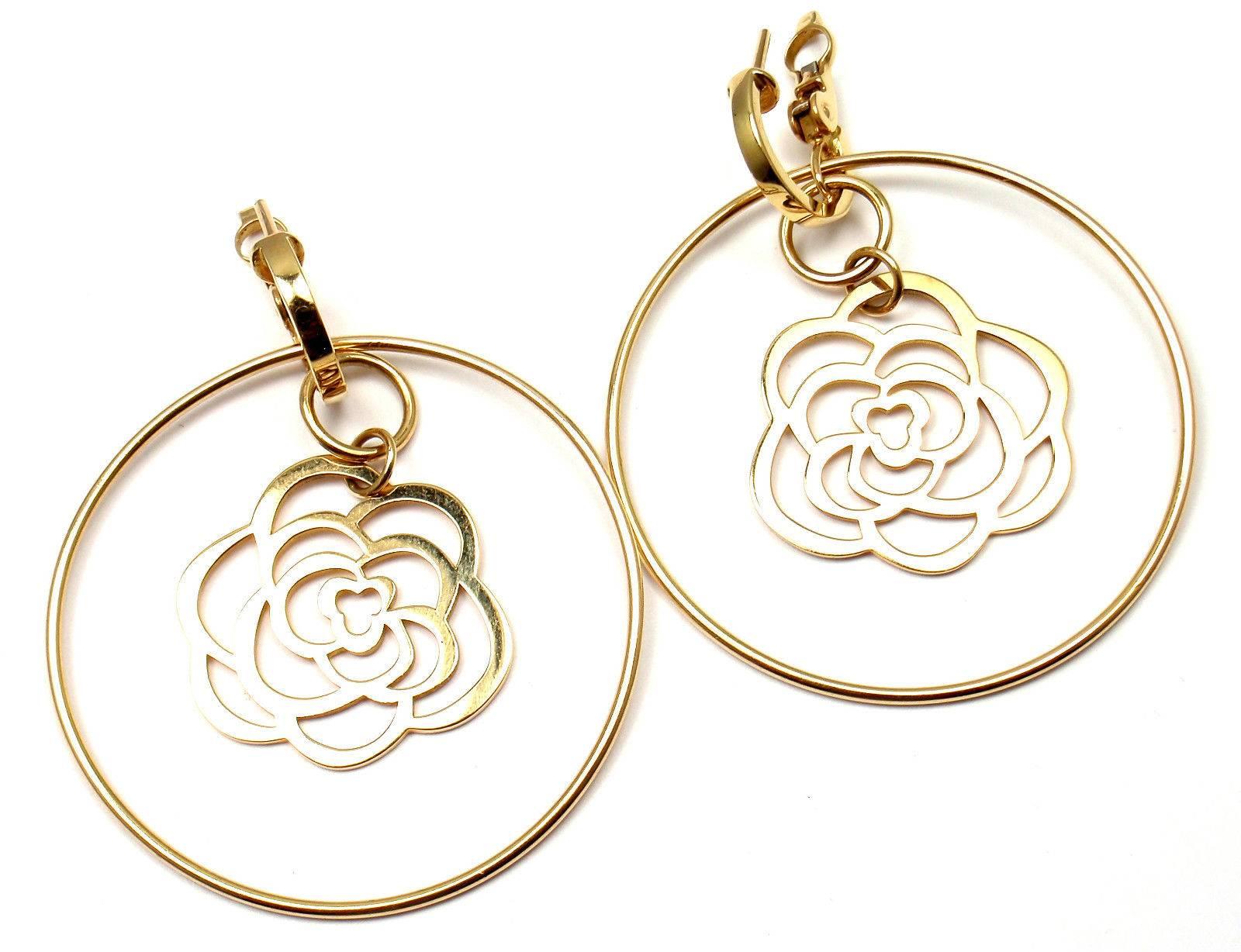 18k Yellow Gold Camelia Camellia Large Flower Hoop Earrings by Chanel. 
These earrings are for pierced ears.

Details: 
Measurements: 2
