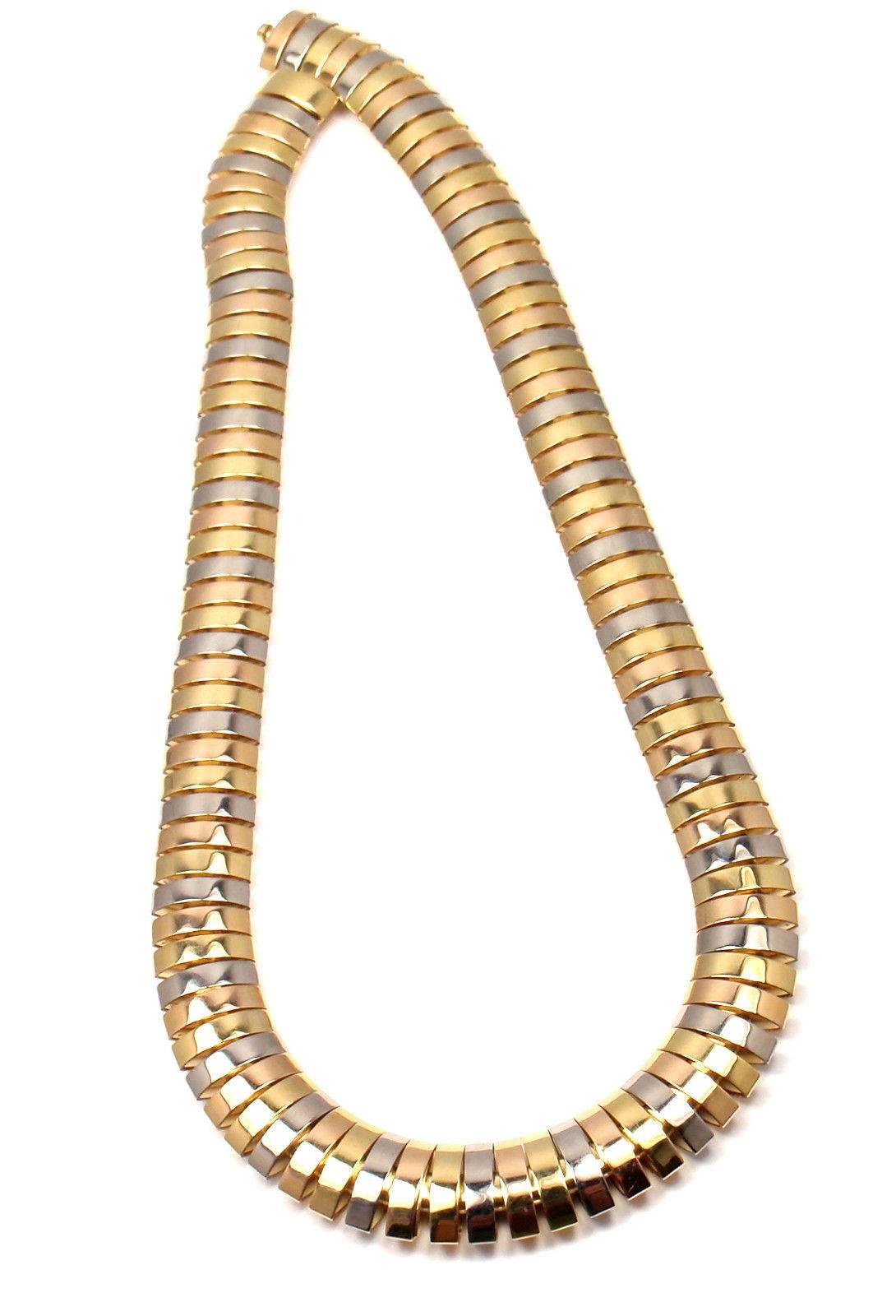 18k Tri-Color Gold Snake Necklace by Cartier. 
This necklace comes with original Cartier box.

Details: 
Weight: 96.6 grams
Length: 16