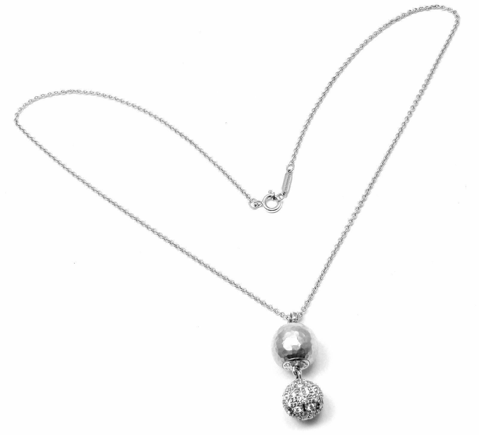 18k White Gold Diamond Pendant Necklace by Paloma Picasso for 
Tiffany & Co. 
With 40 round brilliant cut diamonds VS1 clarity, G color total weight 
approx. 1ct

Details: 
Length: 16