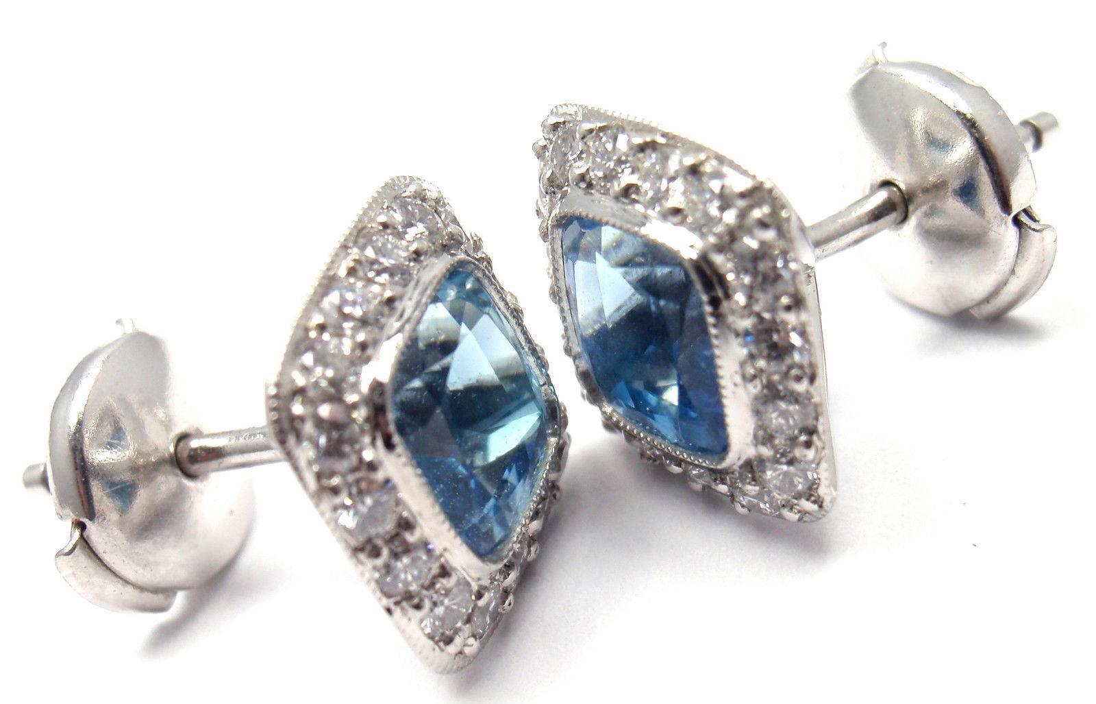 Platinum Diamond And Aquamarine Legacy Earrings by Tiffany & Co. 
With 32 round brilliant cut diamonds VS1 clarity, G color total weight approx. .40ct
2 aquamarines total weight approx. 4ct

Details:
Dimensions: 10mm x 10mm
Weight: 5.5