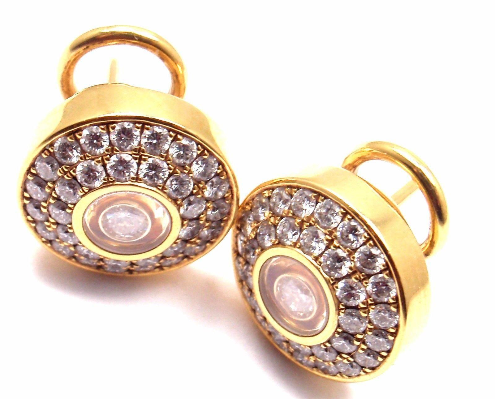 18k Yellow Gold Happy Diamond Earrings by Chopard.  
With 62 round brilliant cut diamonds VS1 clarity, G color total weight approx. 1.30ct
These earrings come with Chopard certificate and a Chopard box.
These earrings are for pierced