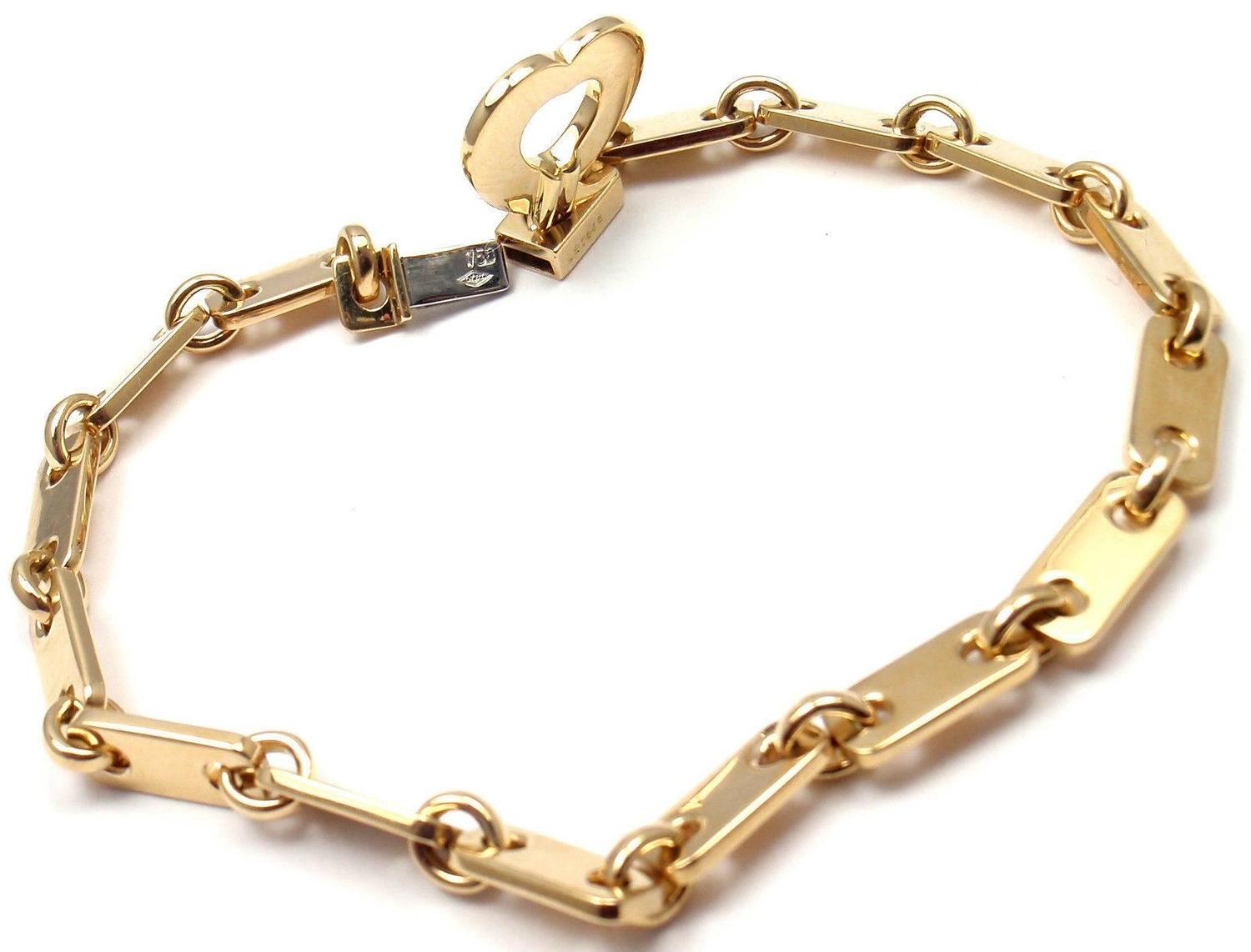Cartier Gold Heart Lock Charm Link Bracelet at 1stdibs