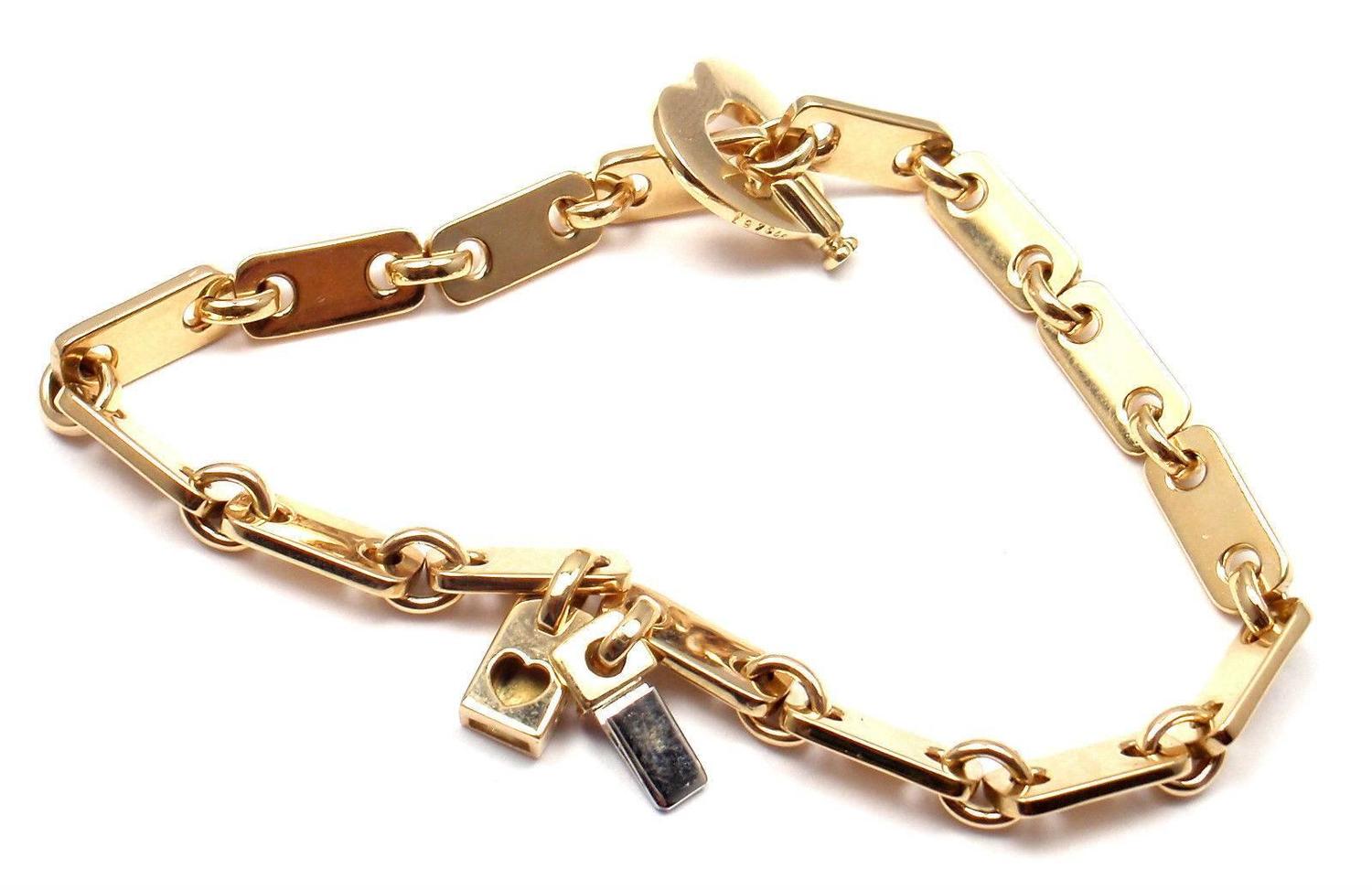 Cartier Gold Heart Lock Charm Link Bracelet at 1stdibs