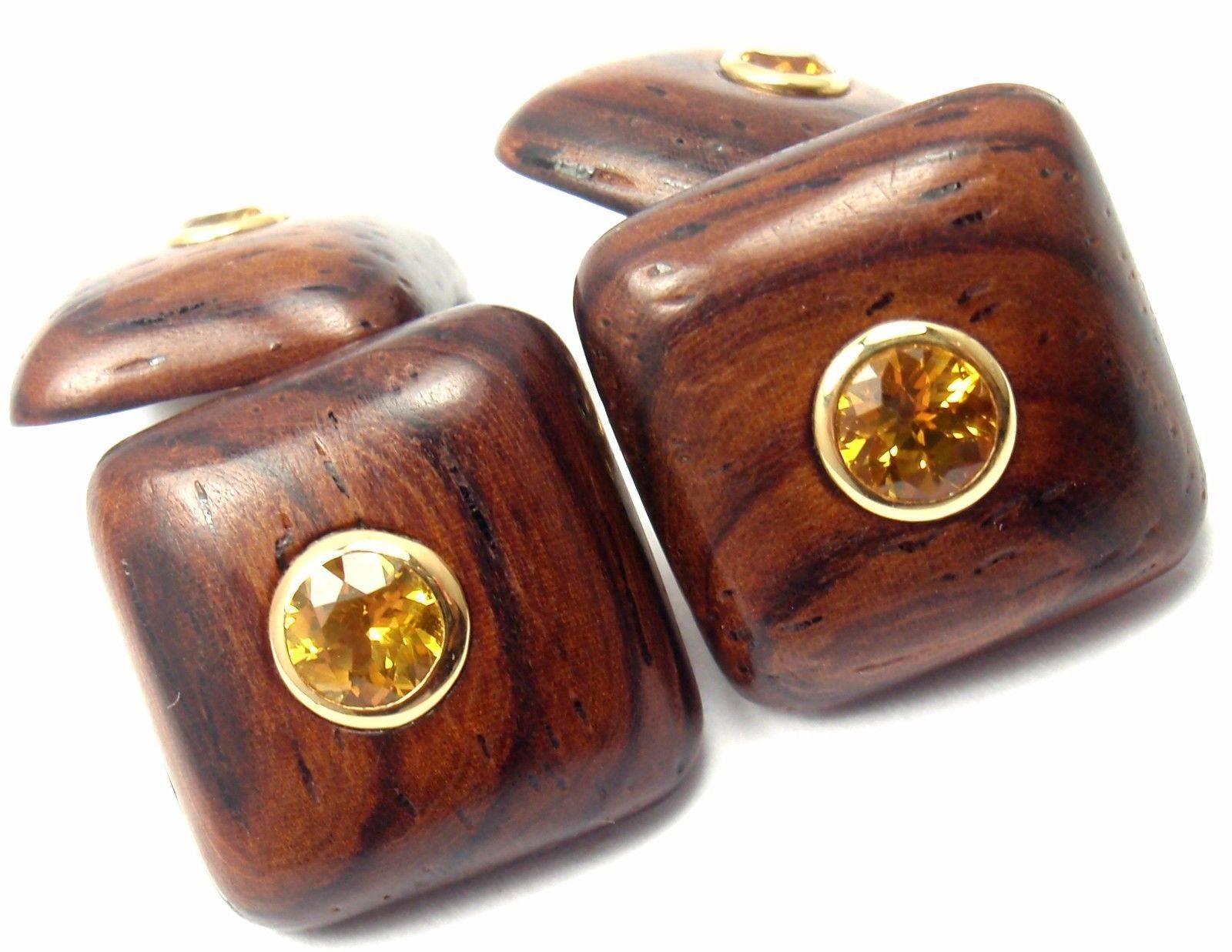 18k Yellow Gold Yellow Sapphire Wood Cufflinks by Tiffany & Co.
With 4 Round Yellow Sapphires
4 Wood

Details:
Measurements: 13mm x 12mm x 25mm
Weight: 4.8 grams
Stamped Hallmarks: Tiffany & Co.. 750
*Free Shipping within the United