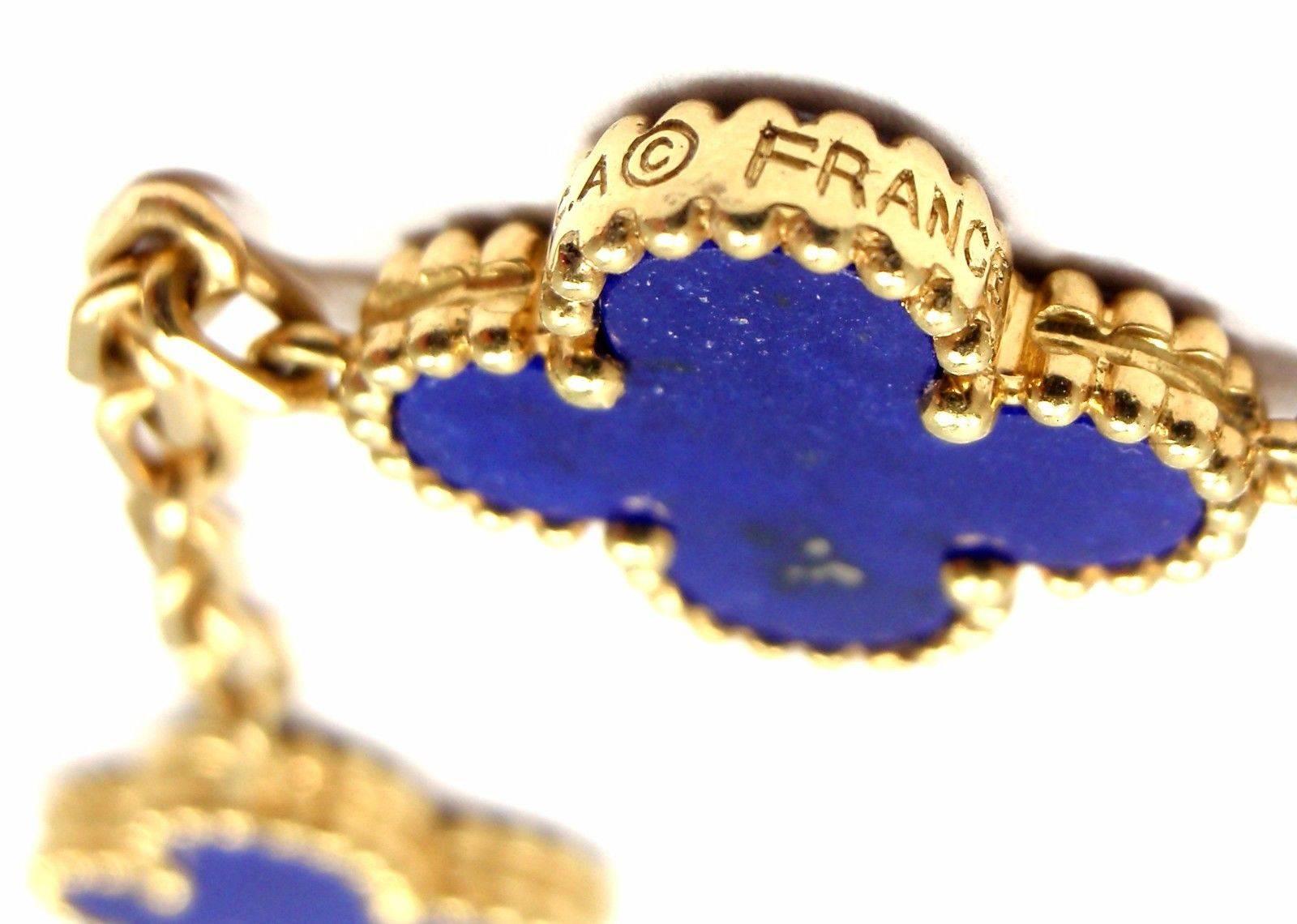 18k Yellow Gold Vintage Alhambra Lapis Lazuli Necklace by 
Van Cleef & Arpels.
With 20 motifs of lapis lazuli alhambra stones 15mm each
*** This is an extremely rare, highly collectible lapis lazuli alhambra necklace by Van Cleef