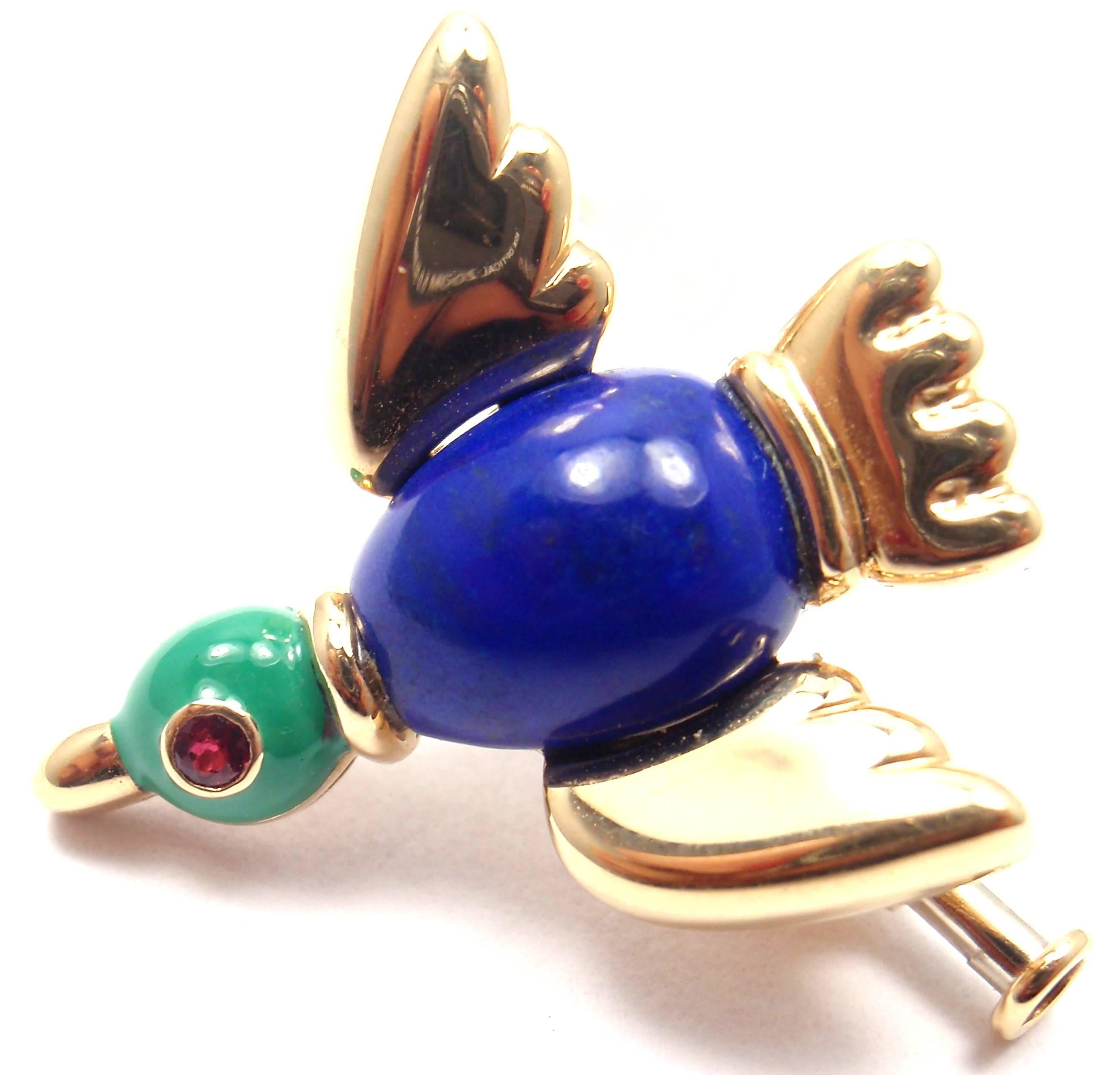18k Yellow Gold Lapis Lazuli Ruby Brooch Pin by Cartier. 
With 1 lapis lazuli 10mm x 8mm
1 small ruby in the eye

Details: 
Measurements: 23mm x 22mm 
Weight: 6.8 grams 
Stamped Hallmarks: Cartier 750 1991 928650
*Free Shipping within the