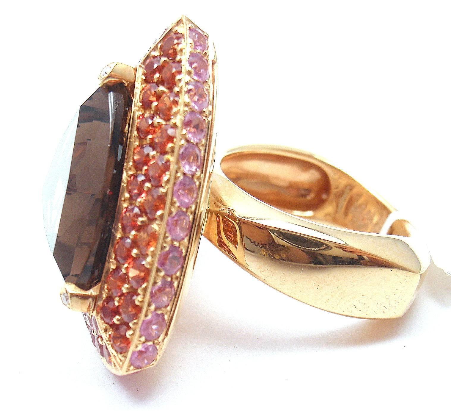 18k Yellow Gold Topaz Amethyst Citrine Large Triangle Ring by Mauboussin.  
With Large topaz (15 x 17mm) surrounded by citrines and amethysts, flanked by three small diamonds at tips
This ring comes with Mauboussin Box.

Details:  
Weight: 18.6