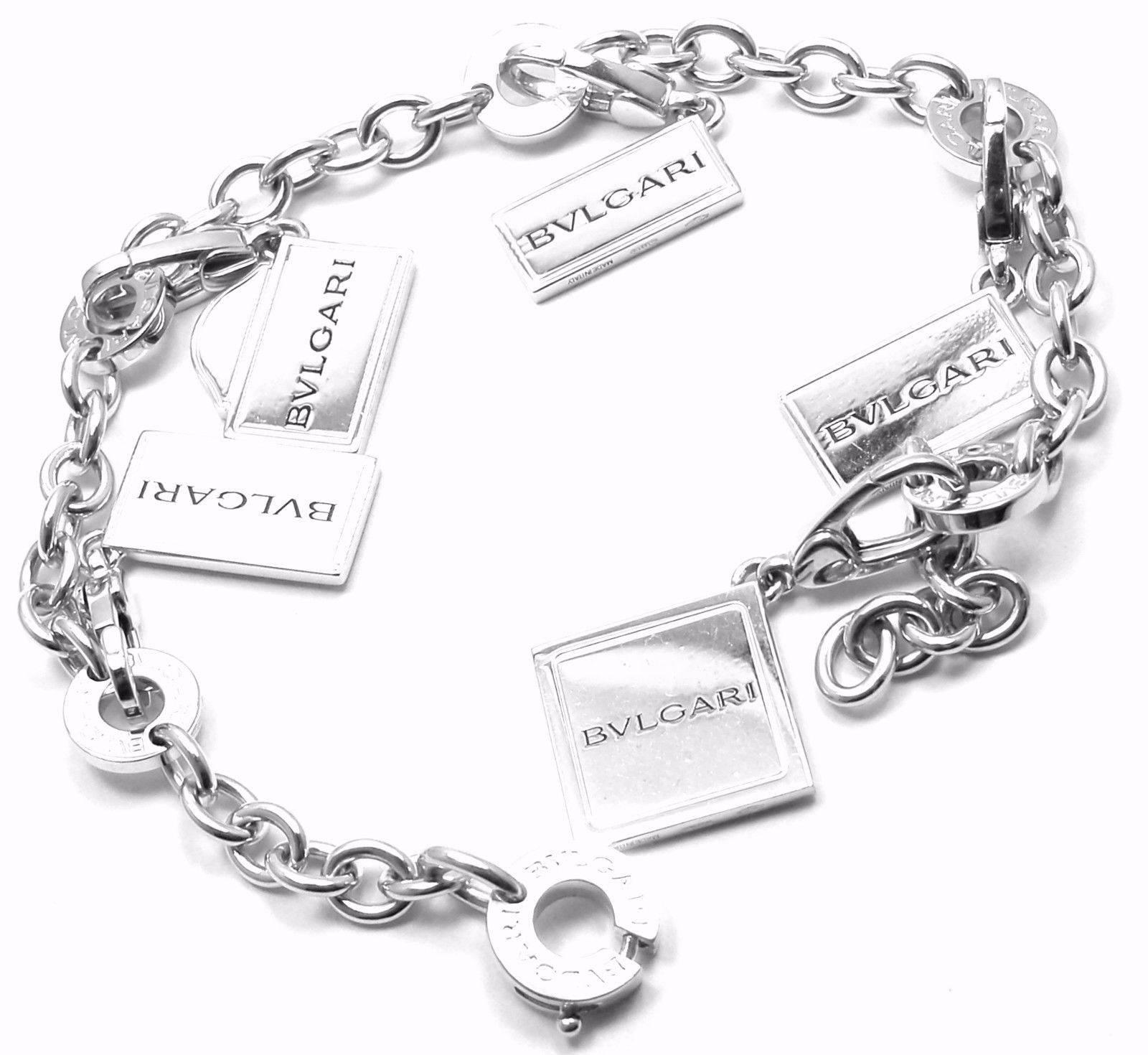 18k White Gold Charm Bracelet with 5 Charms of Major Bulgari Outlets by Bulgari. 
With 5 charms of major Bulgari outlets Via Dei Condotti, 1er Arr. Place Vendome, Ginza St, New Bond Street w1 City of Westminister, Fifth Ave.
This bracelet comes